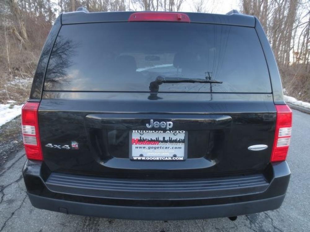 2014 Black /Black Jeep Patriot Latitude (1C4NJRFB6ED) with an 2.4L 4cyl engine, Automatic transmission, located at 270 US Route 6, Mahopac, NY, 10541, (845) 621-0895, 41.349022, -73.755280 - Photo #5