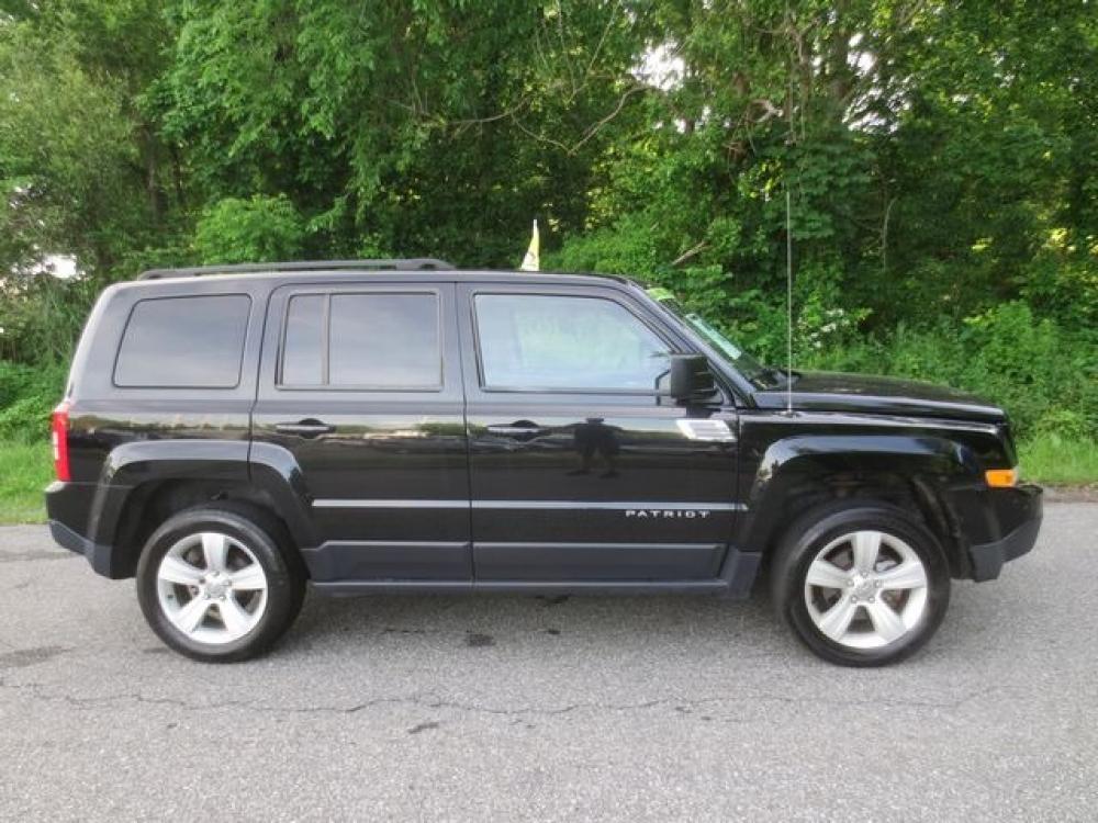 2014 Black /Black Jeep Patriot Latitude (1C4NJRFB6ED) with an 2.4L 4cyl engine, Automatic transmission, located at 270 US Route 6, Mahopac, NY, 10541, (845) 621-0895, 41.349022, -73.755280 - Photo #9