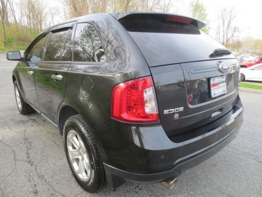 2011 Black /Black Ford Edge SEL FWD (2FMDK3JC4BB) with an 3.5L V6 DOHC 24V engine, 6-Speed Automatic transmission, located at 270 US Route 6, Mahopac, NY, 10541, (845) 621-0895, 41.349022, -73.755280 - Photo #4