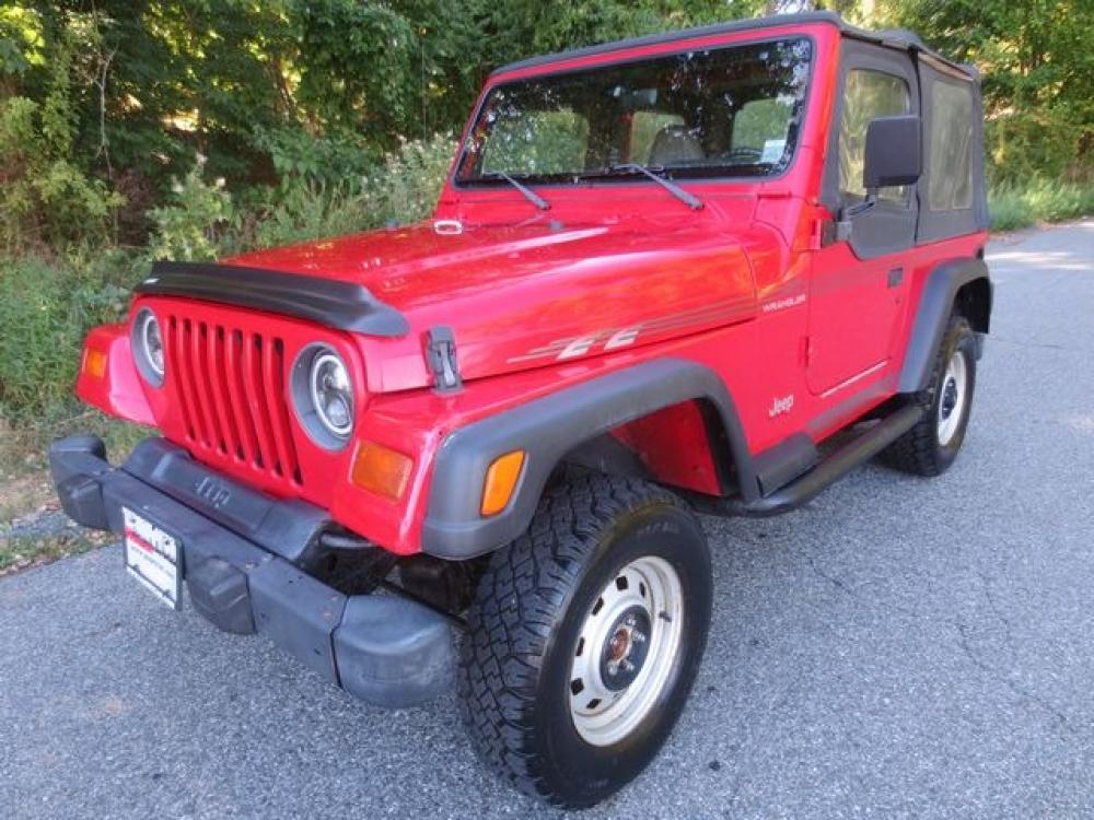 1998 Red /Gray Jeep Wrangler SE (1J4FY29P8WP) with an 2.5L L4 OHV 8V engine, 5 SPEED MANUAL transmission, located at 270 US Route 6, Mahopac, NY, 10541, (845) 621-0895, 41.349022, -73.755280 - Photo #0
