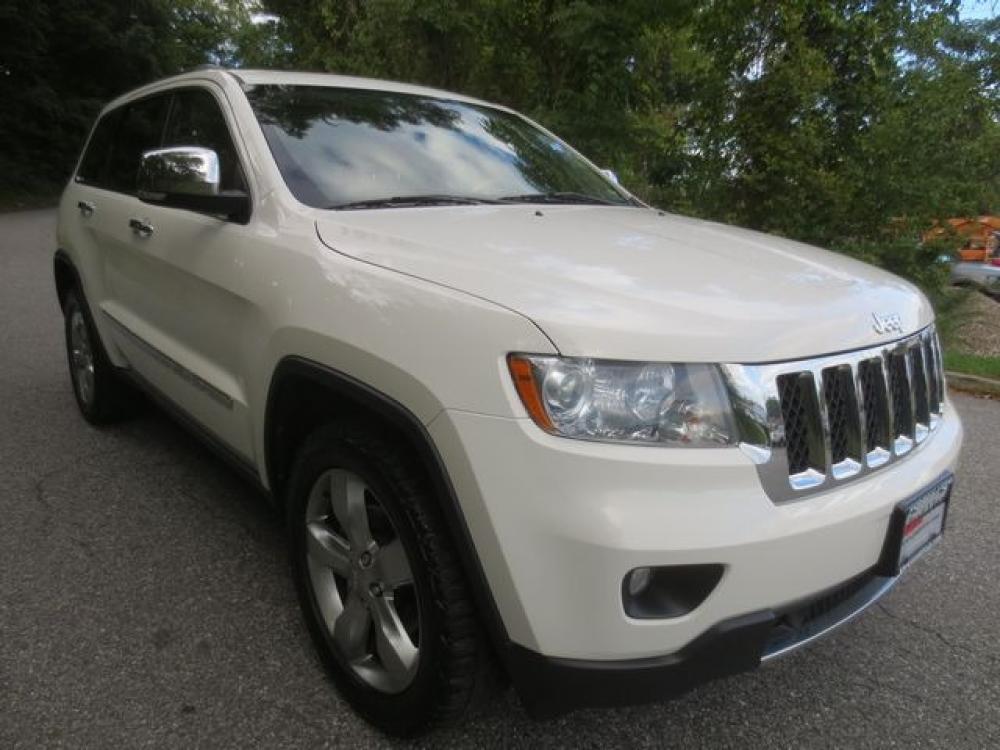 2012 White /Brown Jeep Grand Cherokee Overland 4WD (1C4RJFCG4CC) with an 3.6L V6 DOHC 24V engine, Automatic transmission, located at 270 US Route 6, Mahopac, NY, 10541, (845) 621-0895, 41.349022, -73.755280 - Photo #1