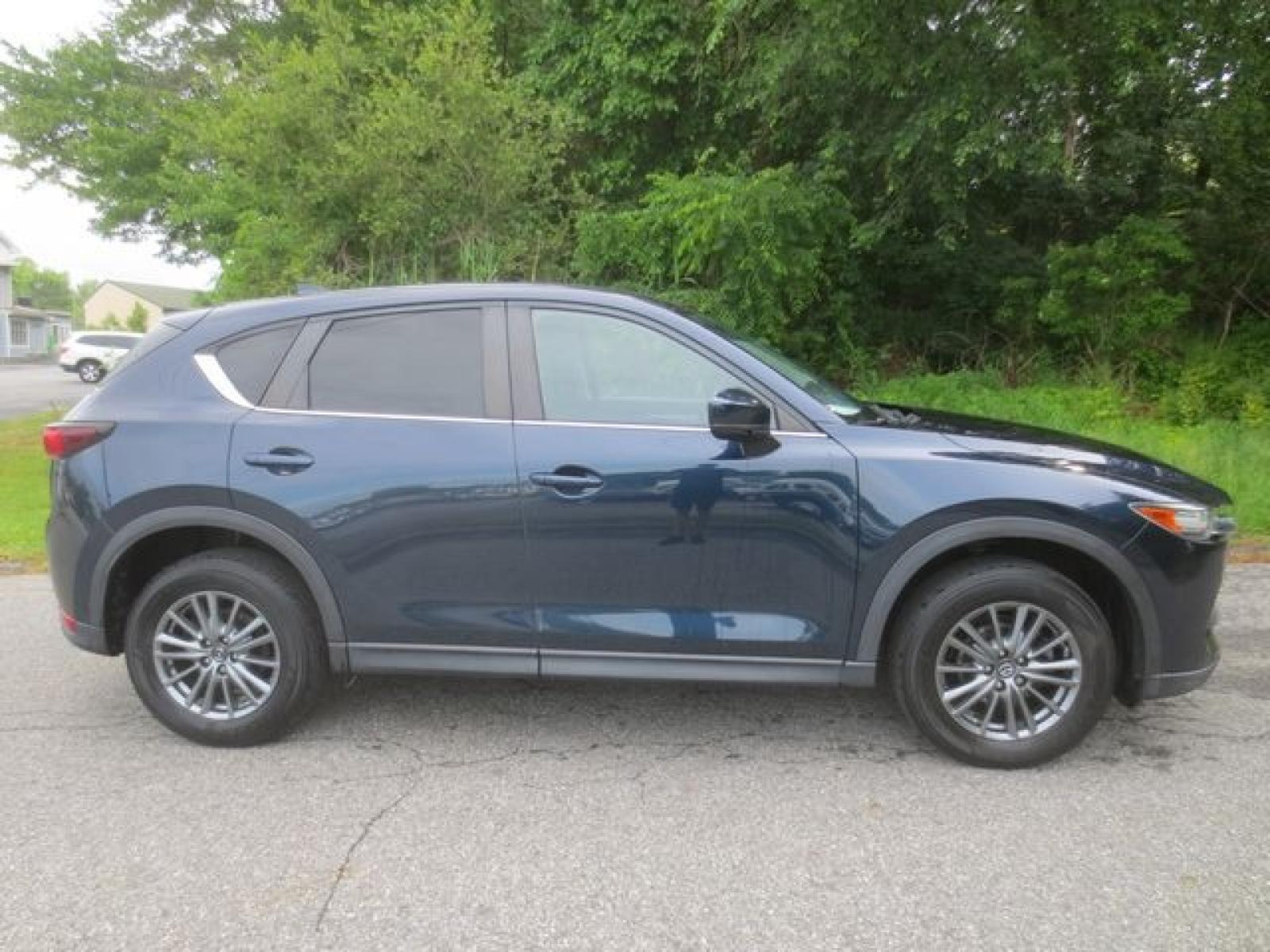 2017 Blue /Tan Mazda CX-5 Touring AWD (JM3KFBCLXH0) with an 2.5L L4 DOHC 16V engine, Automatic transmission, located at 270 US Route 6, Mahopac, NY, 10541, (845) 621-0895, 41.349022, -73.755280 - Photo #10