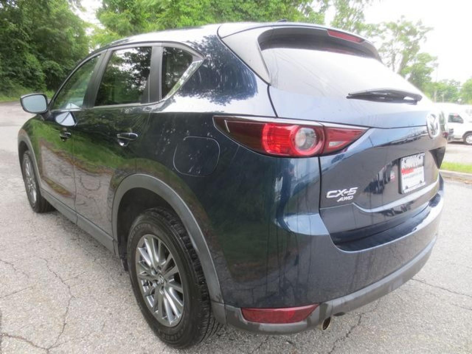 2017 Blue /Tan Mazda CX-5 Touring AWD (JM3KFBCLXH0) with an 2.5L L4 DOHC 16V engine, Automatic transmission, located at 270 US Route 6, Mahopac, NY, 10541, (845) 621-0895, 41.349022, -73.755280 - Photo #4