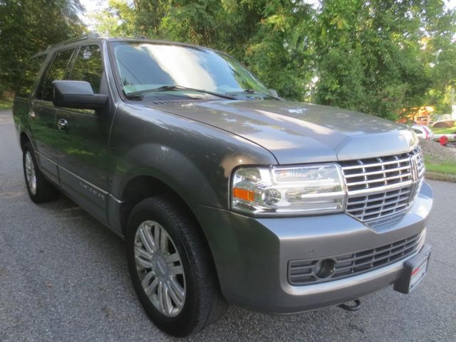 2012 Gray /Tan Lincoln Navigator 4WD (5LMJJ2J54CE) with an 5.4L V8 SOHC 24V engine, 6-Speed Automatic transmission, located at 270 US Route 6, Mahopac, NY, 10541, (845) 621-0895, 41.349022, -73.755280 - Photo #1