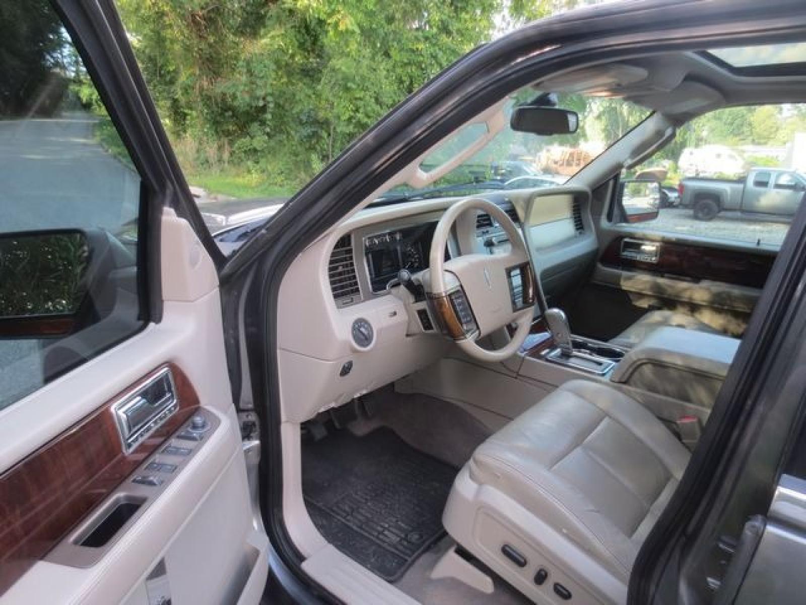 2012 Gray /Tan Lincoln Navigator 4WD (5LMJJ2J54CE) with an 5.4L V8 SOHC 24V engine, 6-Speed Automatic transmission, located at 270 US Route 6, Mahopac, NY, 10541, (845) 621-0895, 41.349022, -73.755280 - Photo #6
