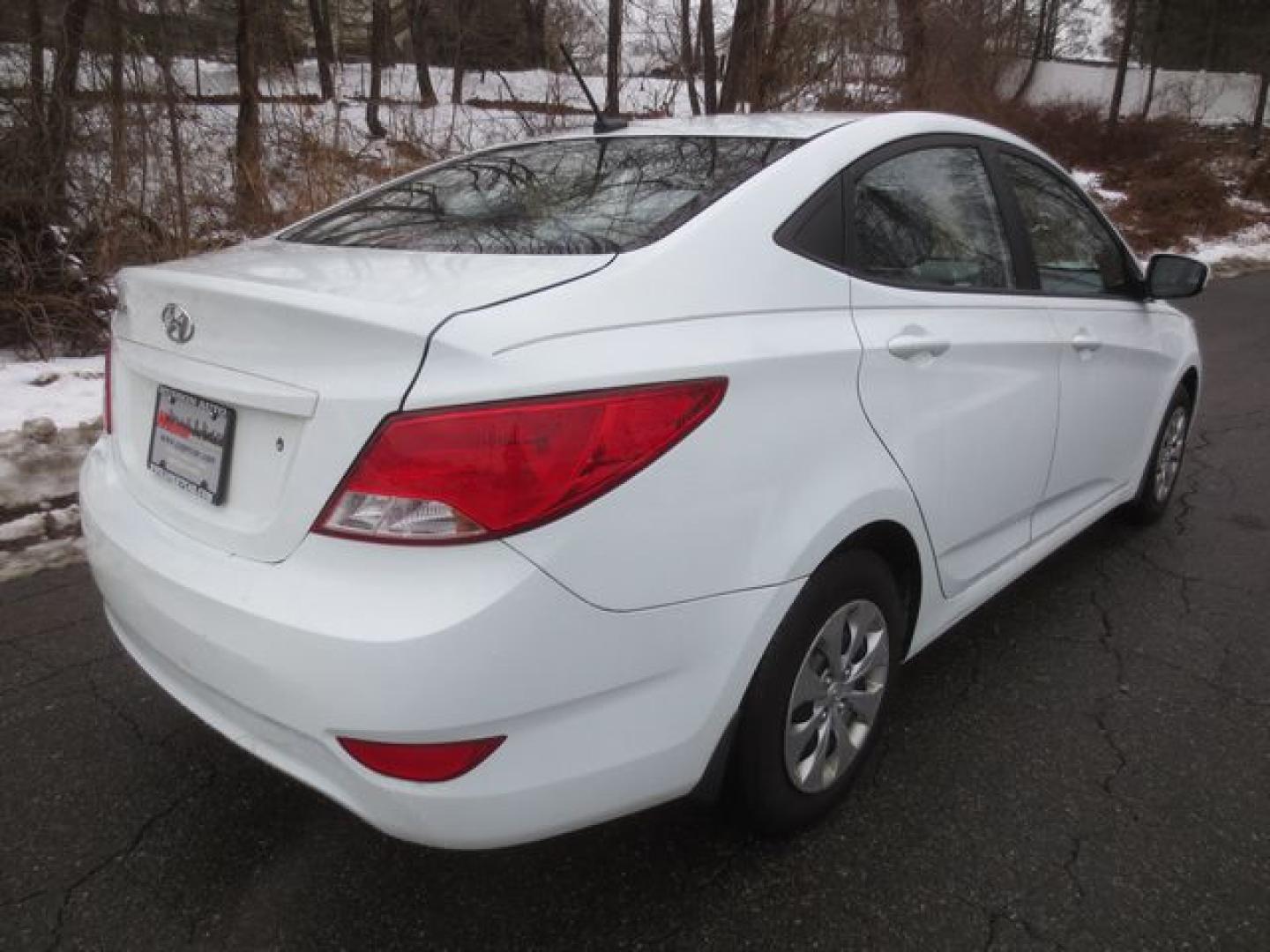 2016 White /Gray Hyundai Accent SE 4-Door 6A (KMHCT4AE7GU) with an 1.6L L4 DOHC 16V engine, 6-SPEED MANUAL transmission, located at 270 US Route 6, Mahopac, NY, 10541, (845) 621-0895, 41.349022, -73.755280 - Photo#3
