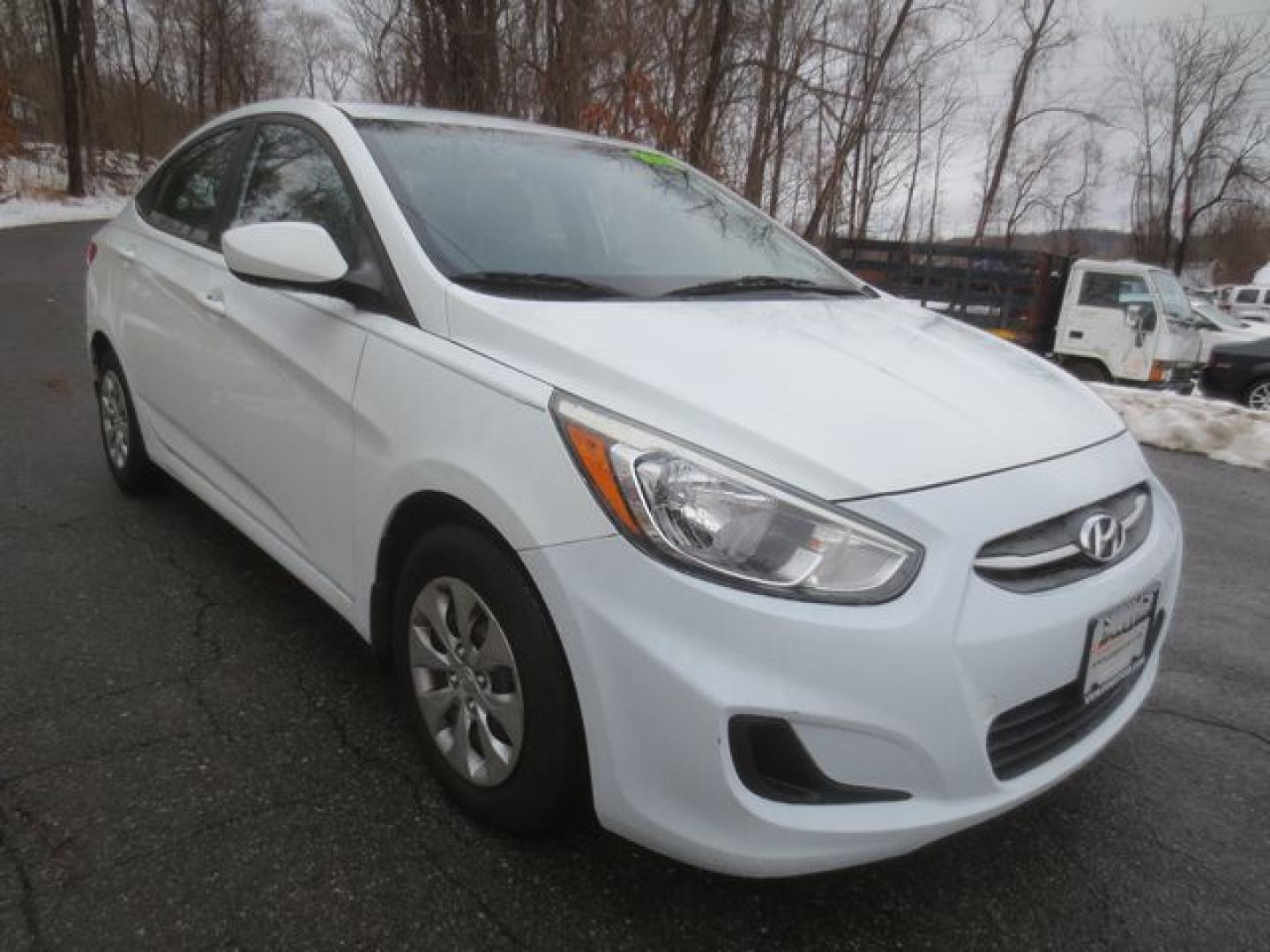 2016 White /Gray Hyundai Accent SE 4-Door 6A (KMHCT4AE7GU) with an 1.6L L4 DOHC 16V engine, 6-SPEED MANUAL transmission, located at 270 US Route 6, Mahopac, NY, 10541, (845) 621-0895, 41.349022, -73.755280 - Photo#1