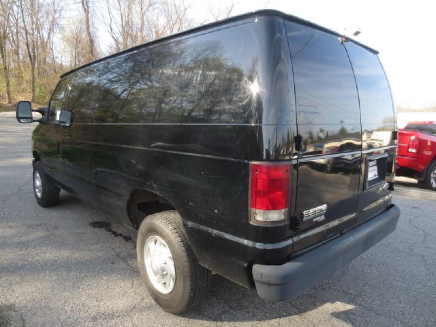 2012 Black /Gray Ford E-Series Van E-350 Super Duty (1FTSE3EL2CD) with an 5.4L V8 SOHC 16V FFV engine, 4-Speed Automatic transmission, located at 270 US Route 6, Mahopac, NY, 10541, (845) 621-0895, 41.349022, -73.755280 - Photo#4