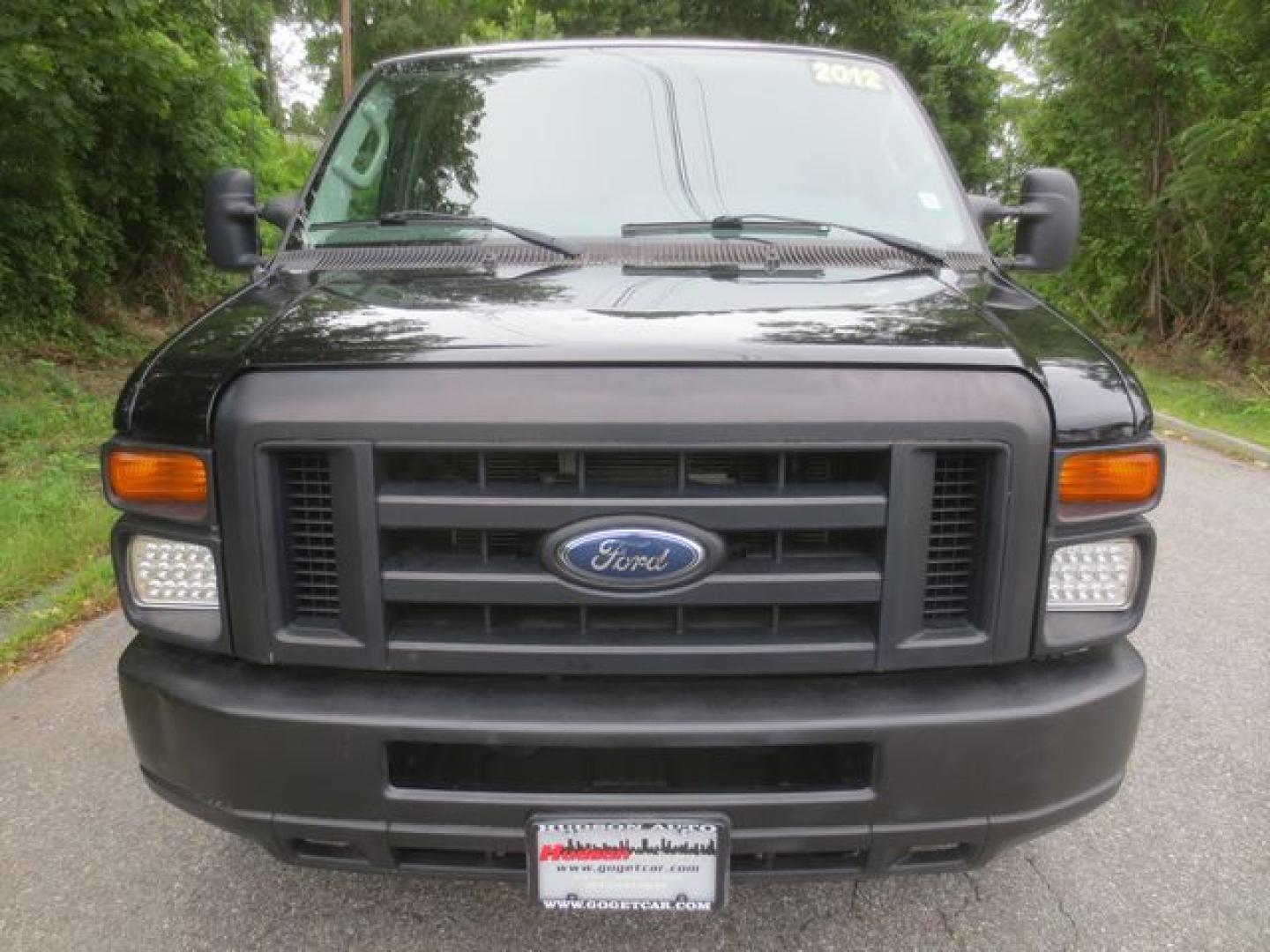 2012 Black /Gray Ford E-Series Van E-350 Super Duty (1FTSE3EL2CD) with an 5.4L V8 SOHC 16V FFV engine, 4-Speed Automatic transmission, located at 270 US Route 6, Mahopac, NY, 10541, (845) 621-0895, 41.349022, -73.755280 - Photo#2