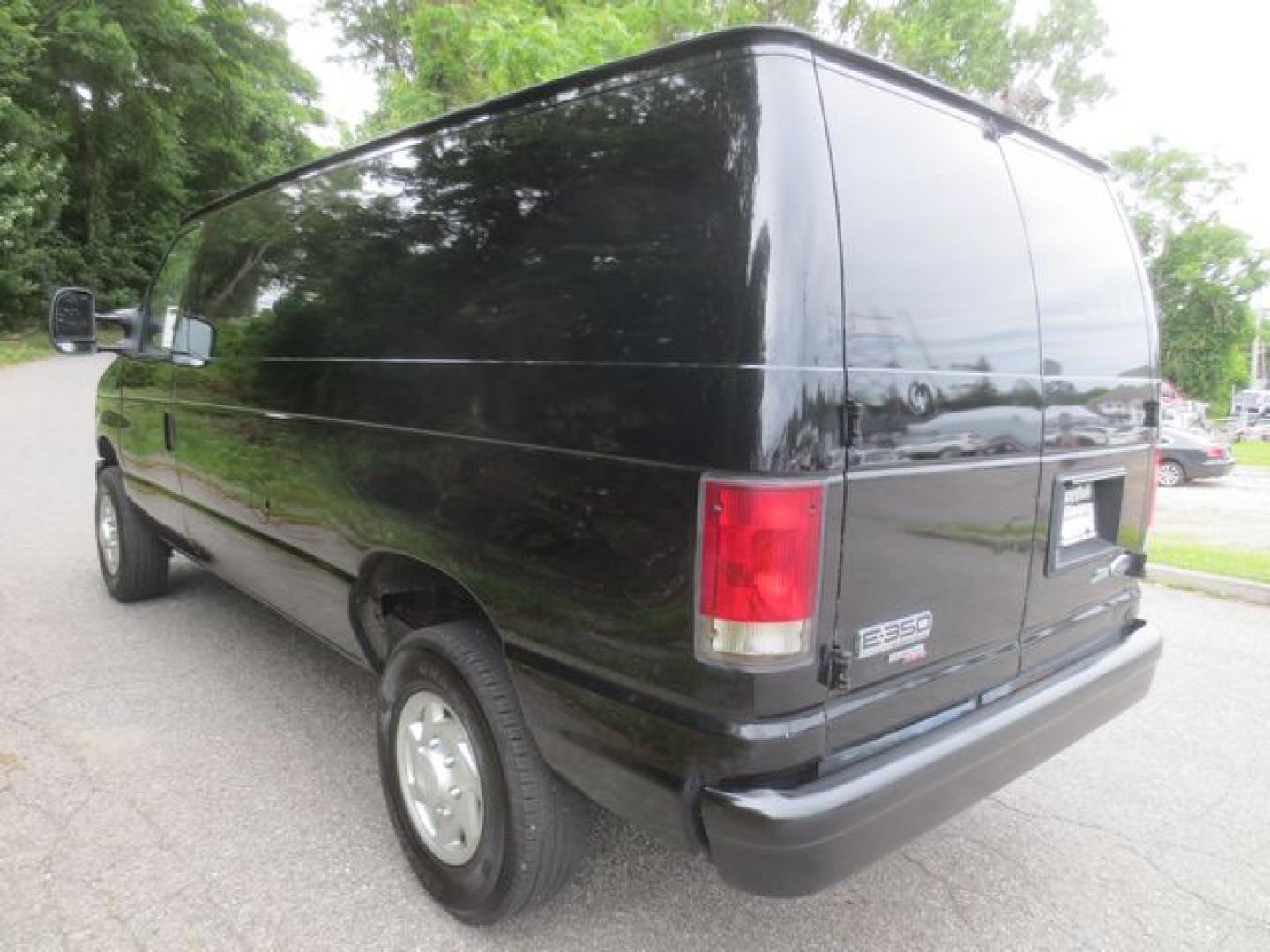 2012 Black /Gray Ford E-Series Van E-350 Super Duty (1FTSE3EL2CD) with an 5.4L V8 SOHC 16V FFV engine, 4-Speed Automatic transmission, located at 270 US Route 6, Mahopac, NY, 10541, (845) 621-0895, 41.349022, -73.755280 - Photo#4