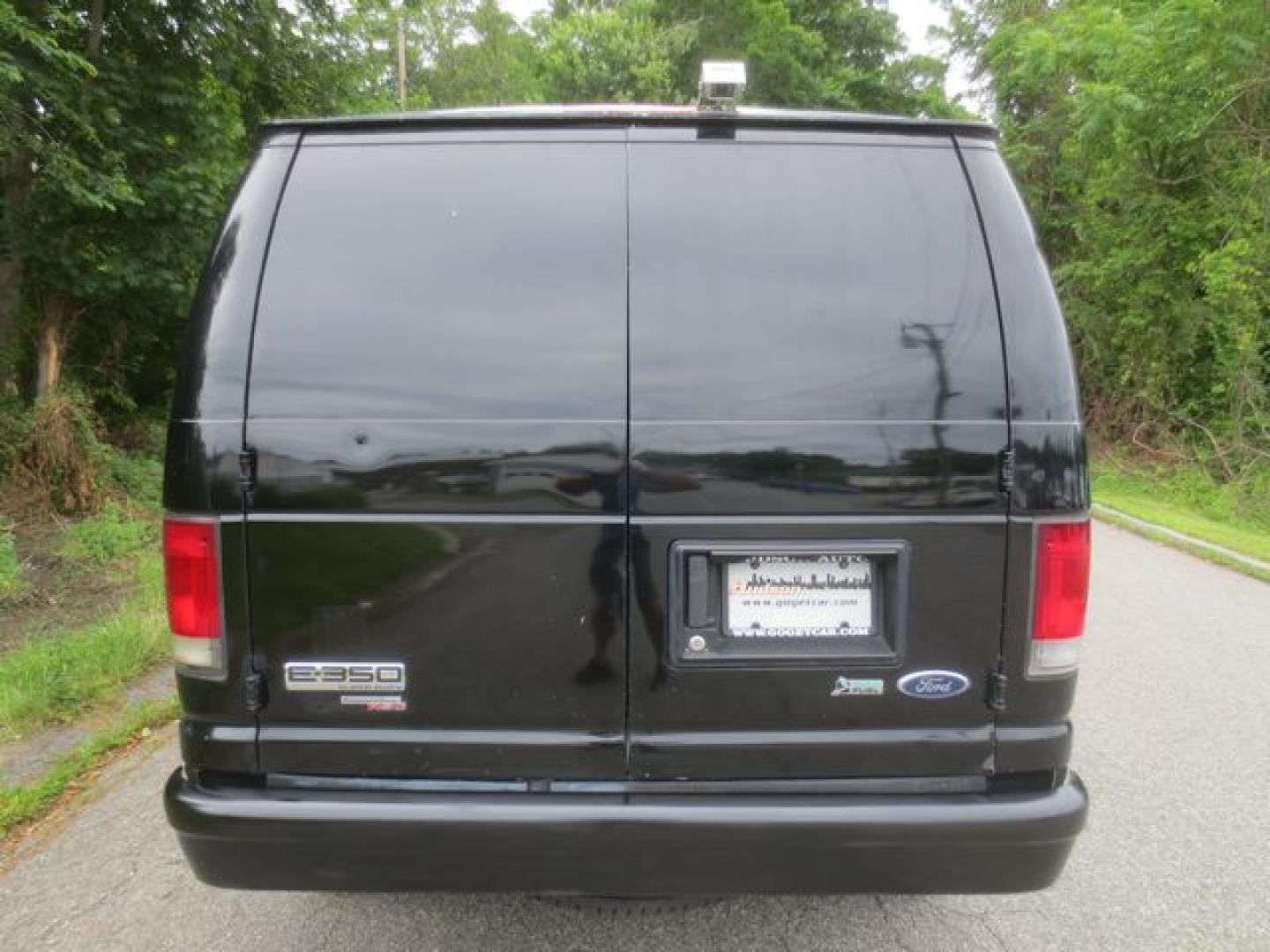 2012 Black /Gray Ford E-Series Van E-350 Super Duty (1FTSE3EL2CD) with an 5.4L V8 SOHC 16V FFV engine, 4-Speed Automatic transmission, located at 270 US Route 6, Mahopac, NY, 10541, (845) 621-0895, 41.349022, -73.755280 - Photo#5