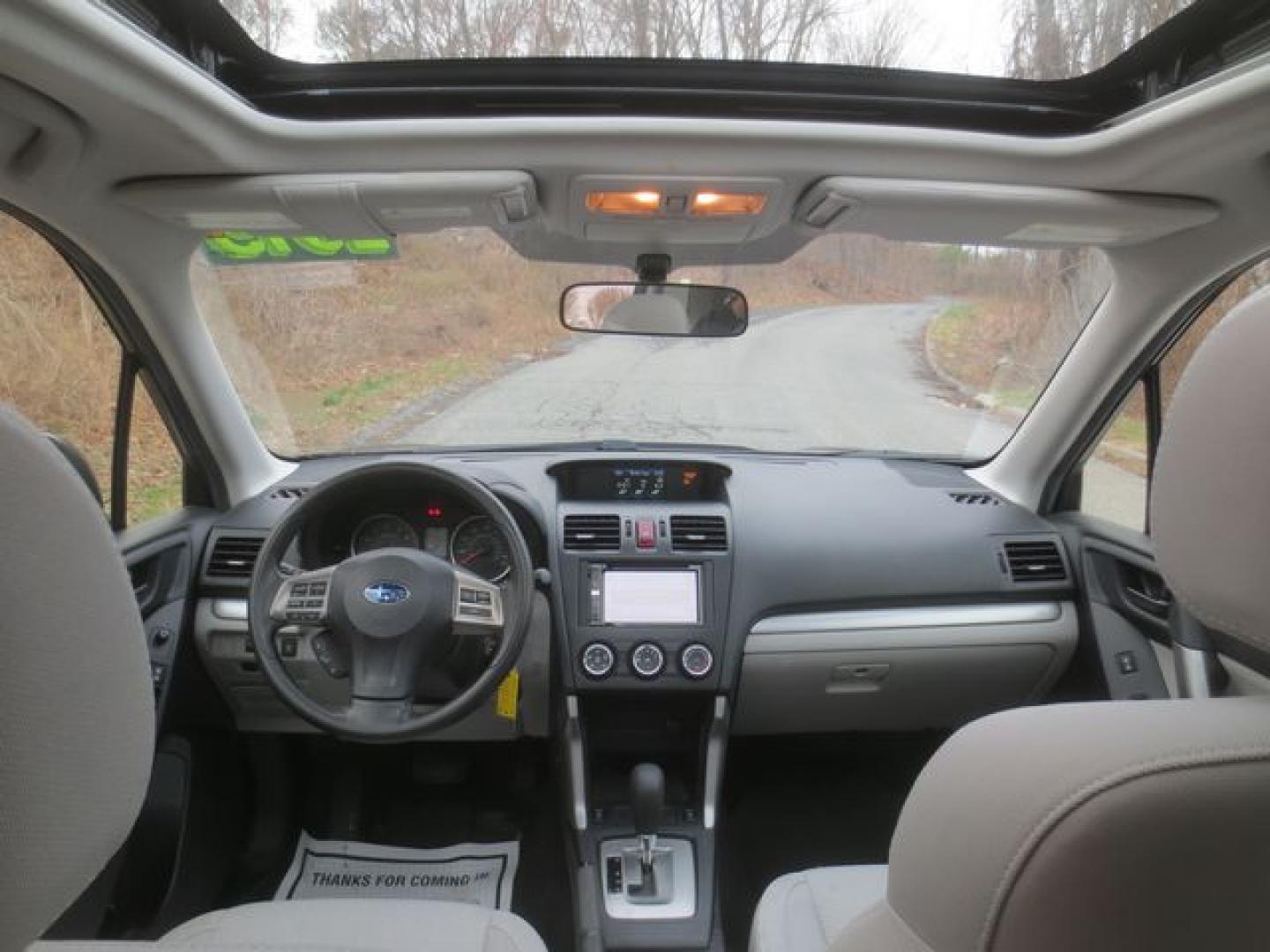 2015 Gray /Gray Subaru Forester 2.5i Premium (JF2SJADC0FH) with an 2.5L H4 SOHC 16V engine, 6-Speed Automatic transmission, located at 270 US Route 6, Mahopac, NY, 10541, (845) 621-0895, 41.349022, -73.755280 - Photo#7