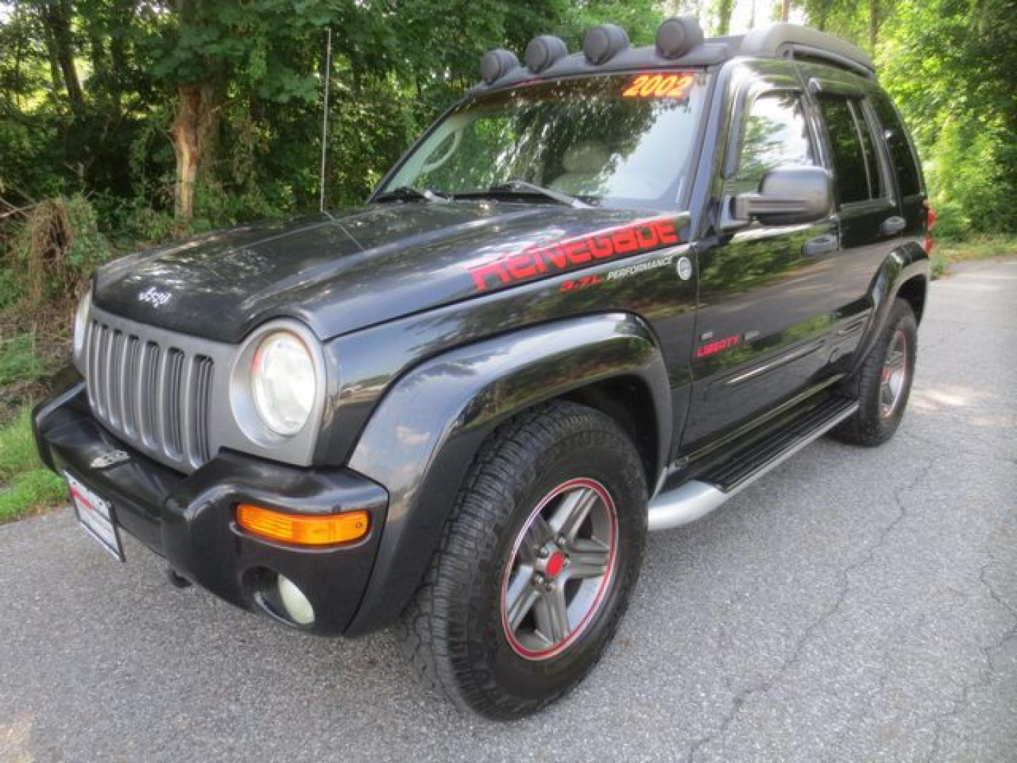 2002 Black /Gray Jeep Liberty Limited Ranagade (1J8GL58K02W) with an 3.7L V6 SOHC 12V engine, 4-Speed Automatic Overdrive transmission, located at 270 US Route 6, Mahopac, NY, 10541, (845) 621-0895, 41.349022, -73.755280 - Photo#0