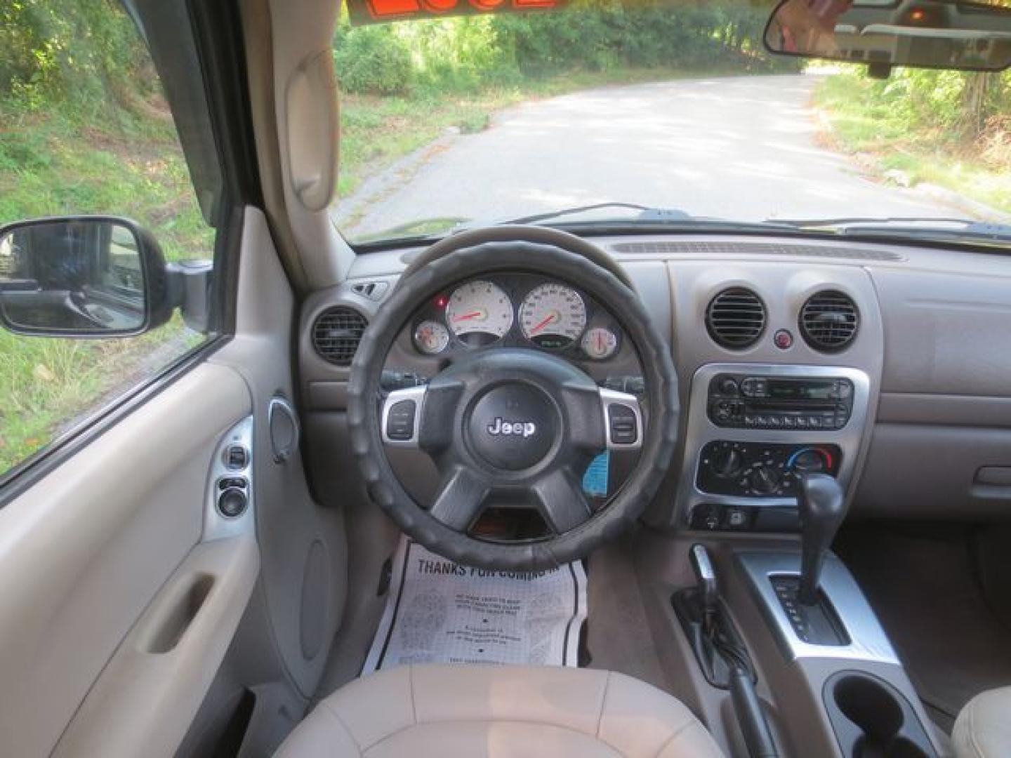 2002 Black /Gray Jeep Liberty Limited Ranagade (1J8GL58K02W) with an 3.7L V6 SOHC 12V engine, 4-Speed Automatic Overdrive transmission, located at 270 US Route 6, Mahopac, NY, 10541, (845) 621-0895, 41.349022, -73.755280 - Photo#8