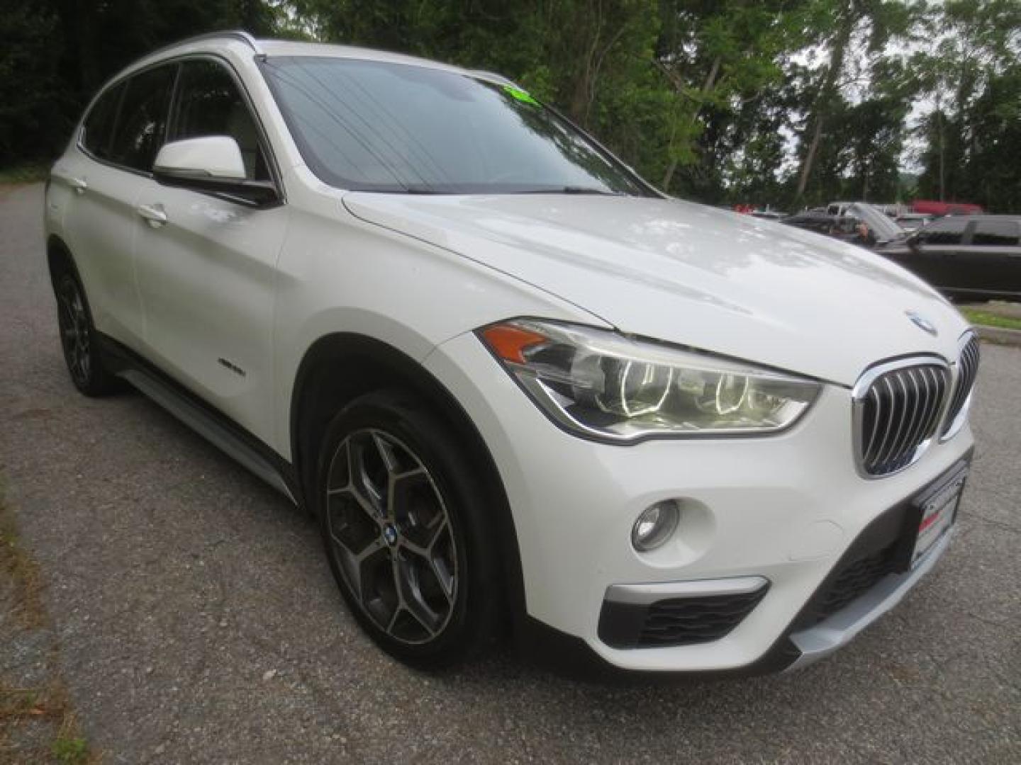 2017 White /Tan BMW X1 xDrive28i (WBXHT3Z34H4) with an 2.0L L4 DOHC 16V engine, Automatic transmission, located at 270 US Route 6, Mahopac, NY, 10541, (845) 621-0895, 41.349022, -73.755280 - Photo#1