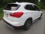 2017 White /Tan BMW X1 xDrive28i (WBXHT3Z34H4) with an 2.0L L4 DOHC 16V engine, Automatic transmission, located at 270 US Route 6, Mahopac, NY, 10541, (845) 621-0895, 41.349022, -73.755280 - Photo#3