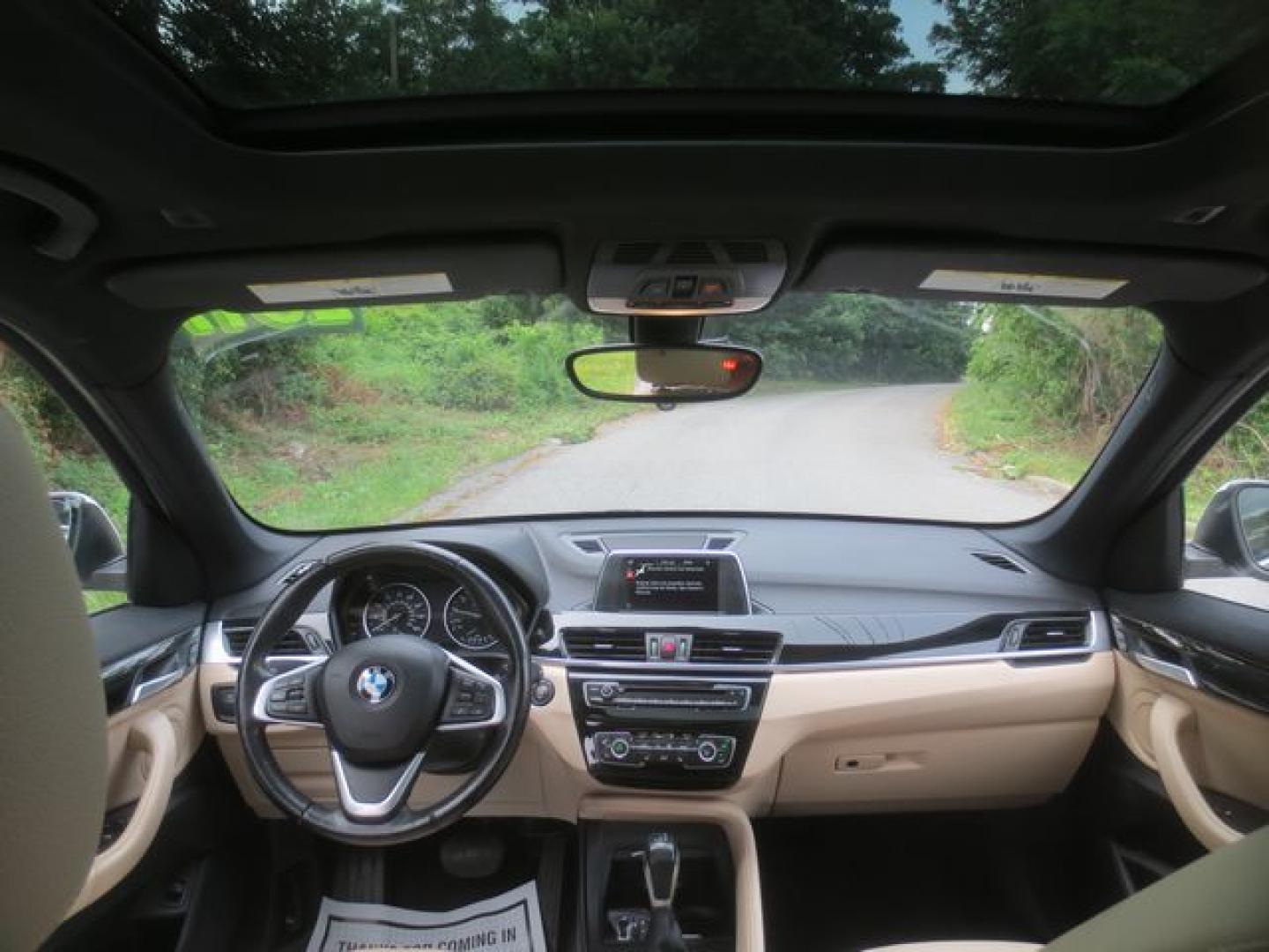 2017 White /Tan BMW X1 xDrive28i (WBXHT3Z34H4) with an 2.0L L4 DOHC 16V engine, Automatic transmission, located at 270 US Route 6, Mahopac, NY, 10541, (845) 621-0895, 41.349022, -73.755280 - Photo#7