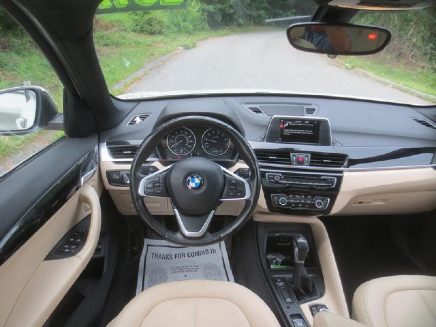 2017 White /Tan BMW X1 xDrive28i (WBXHT3Z34H4) with an 2.0L L4 DOHC 16V engine, Automatic transmission, located at 270 US Route 6, Mahopac, NY, 10541, (845) 621-0895, 41.349022, -73.755280 - Photo#8