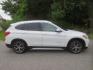 2017 White /Tan BMW X1 xDrive28i (WBXHT3Z34H4) with an 2.0L L4 DOHC 16V engine, Automatic transmission, located at 270 US Route 6, Mahopac, NY, 10541, (845) 621-0895, 41.349022, -73.755280 - Photo#10