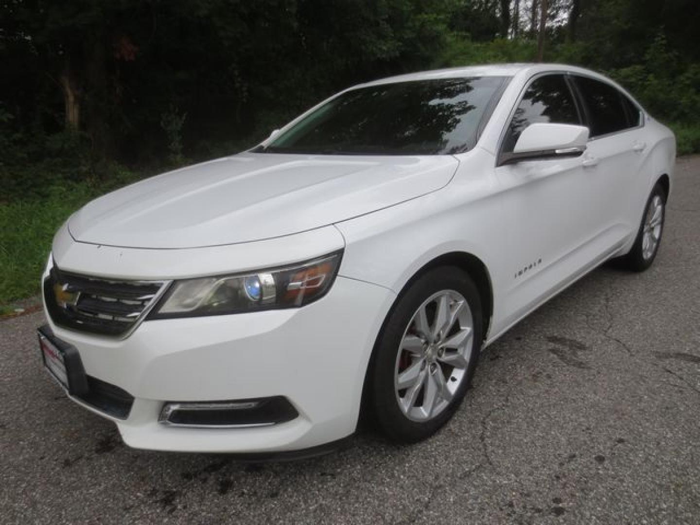 2016 White /Black Chevrolet Impala LT (2G1105SA6G9) with an 2.5L L4 DOHC 16V engine, Automatic 6-Speed transmission, located at 270 US Route 6, Mahopac, NY, 10541, (845) 621-0895, 41.349022, -73.755280 - Photo#0