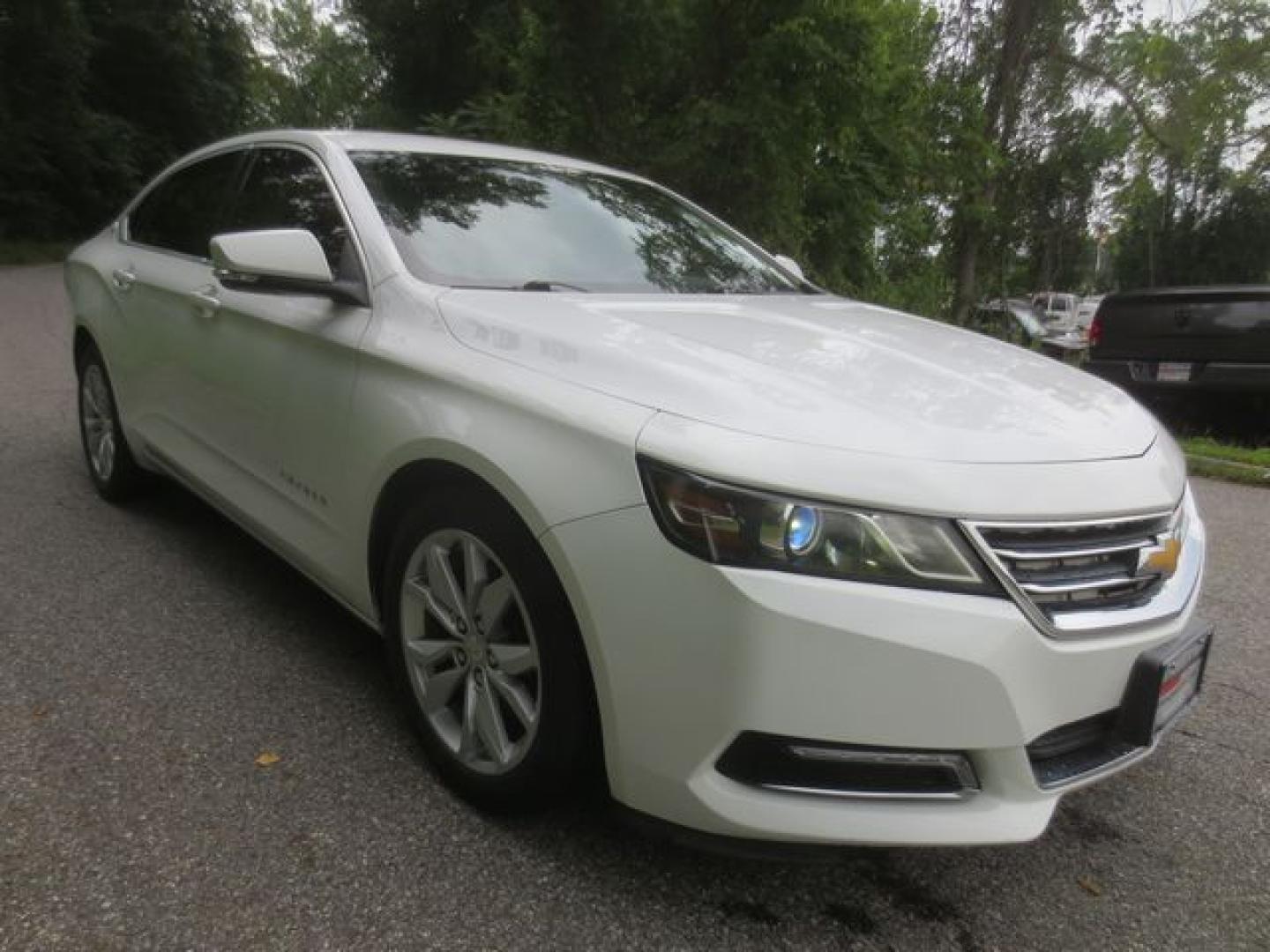 2016 White /Black Chevrolet Impala LT (2G1105SA6G9) with an 2.5L L4 DOHC 16V engine, Automatic 6-Speed transmission, located at 270 US Route 6, Mahopac, NY, 10541, (845) 621-0895, 41.349022, -73.755280 - Photo#1