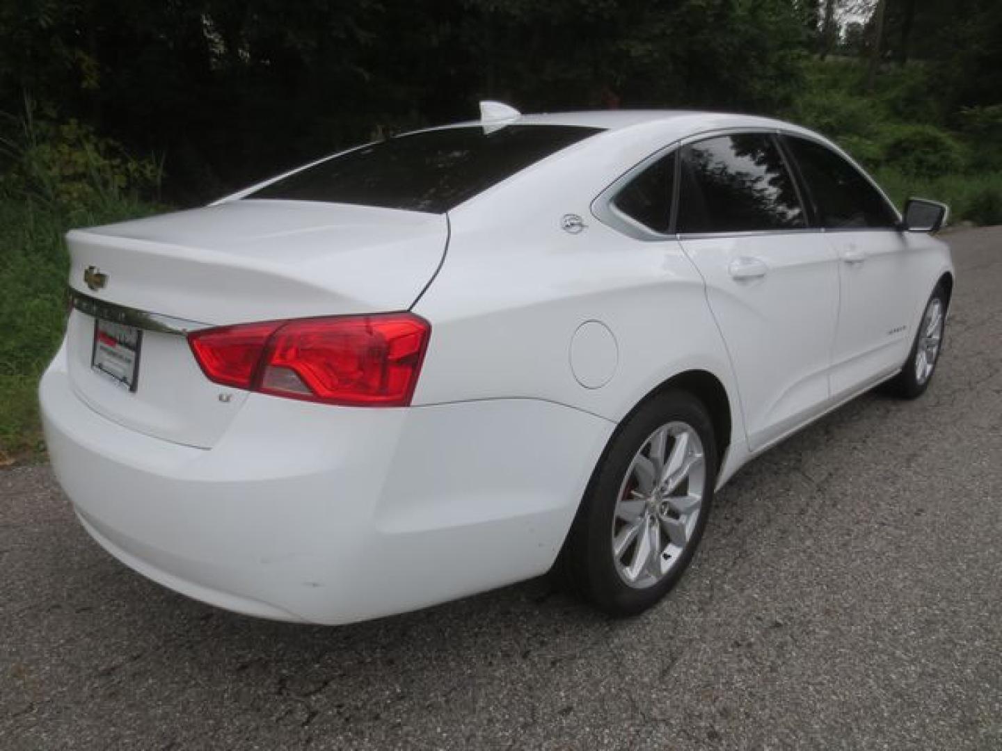 2016 White /Black Chevrolet Impala LT (2G1105SA6G9) with an 2.5L L4 DOHC 16V engine, Automatic 6-Speed transmission, located at 270 US Route 6, Mahopac, NY, 10541, (845) 621-0895, 41.349022, -73.755280 - Photo#3
