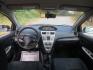 2007 Silver /Gray Toyota Yaris Sedan (JTDBT923871) with an 1.5L L4 DOHC 16V engine, 5 Speed Manual transmission, located at 270 US Route 6, Mahopac, NY, 10541, (845) 621-0895, 41.349022, -73.755280 - Photo#7