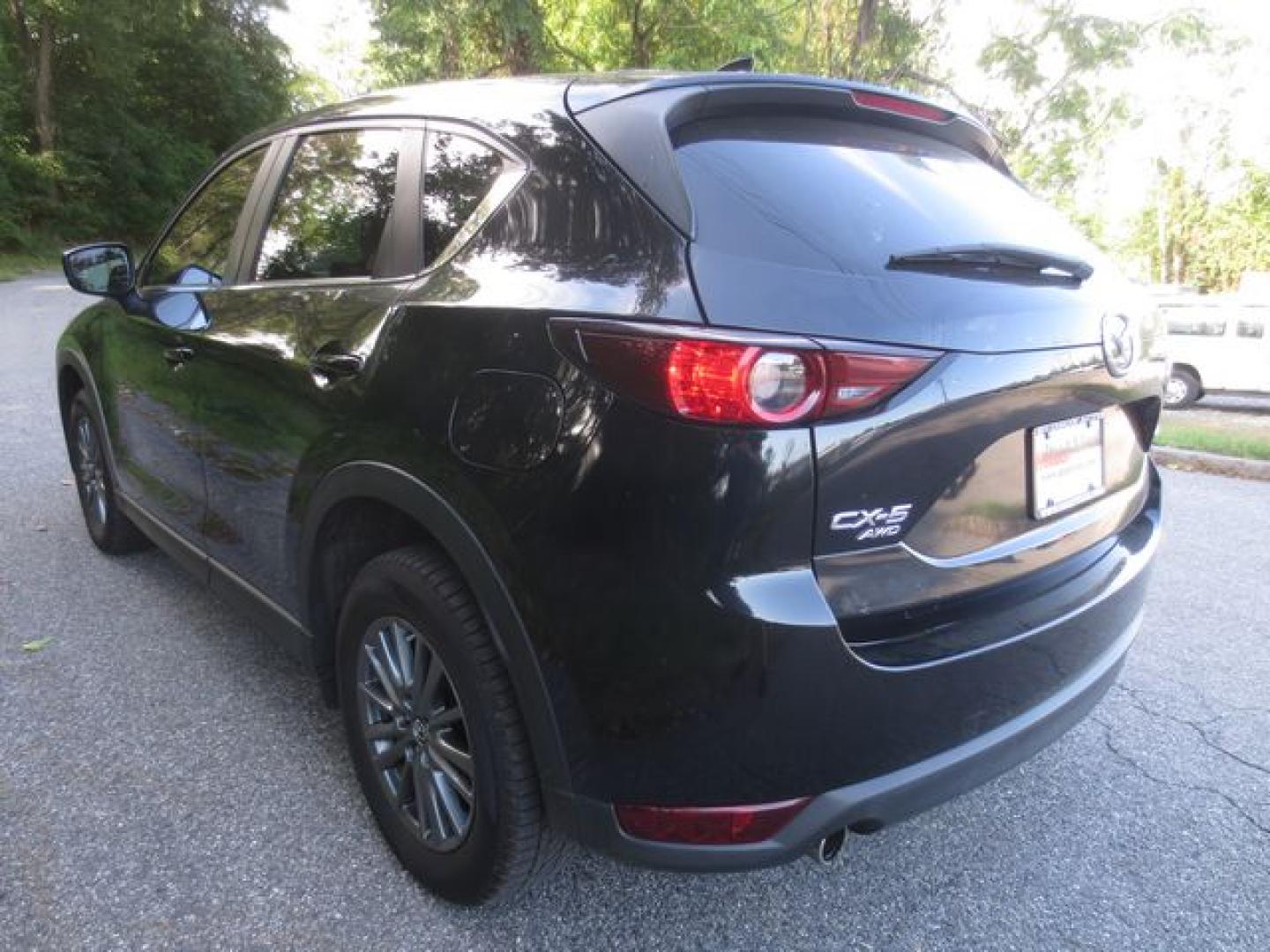 2017 Black /Black Mazda CX-5 Touring (JM3KFBCL6H0) with an 2.5L L4 DOHC 16V engine, 6 Speed Automatic transmission, located at 270 US Route 6, Mahopac, NY, 10541, (845) 621-0895, 41.349022, -73.755280 - Photo#4