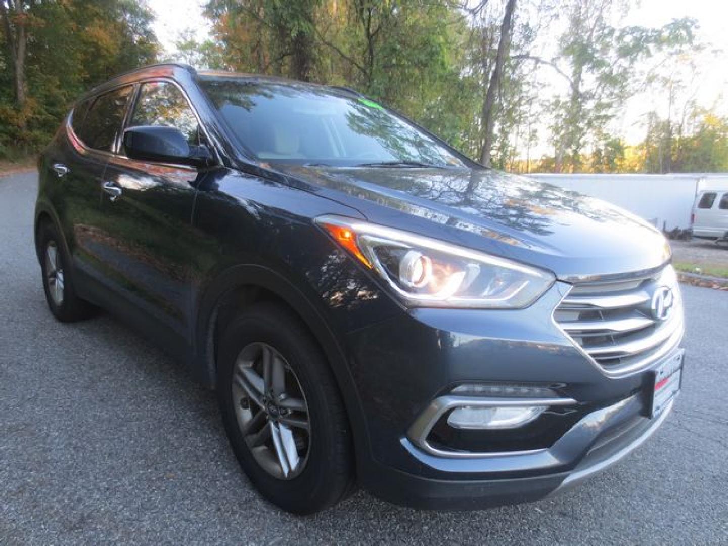 2017 Blue /Gray Hyundai Santa Fe Sport (5NMZUDLB9HH) with an 2.4L L4 DOHC 16V engine, 6 Speed Automatic transmission, located at 270 US Route 6, Mahopac, NY, 10541, (845) 621-0895, 41.349022, -73.755280 - Photo#1