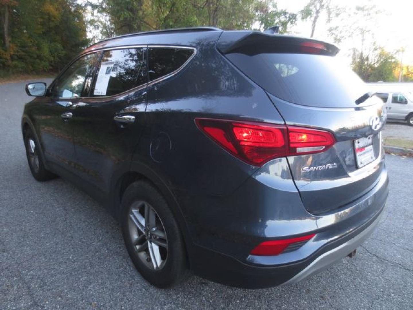 2017 Blue /Gray Hyundai Santa Fe Sport (5NMZUDLB9HH) with an 2.4L L4 DOHC 16V engine, 6 Speed Automatic transmission, located at 270 US Route 6, Mahopac, NY, 10541, (845) 621-0895, 41.349022, -73.755280 - Photo#4