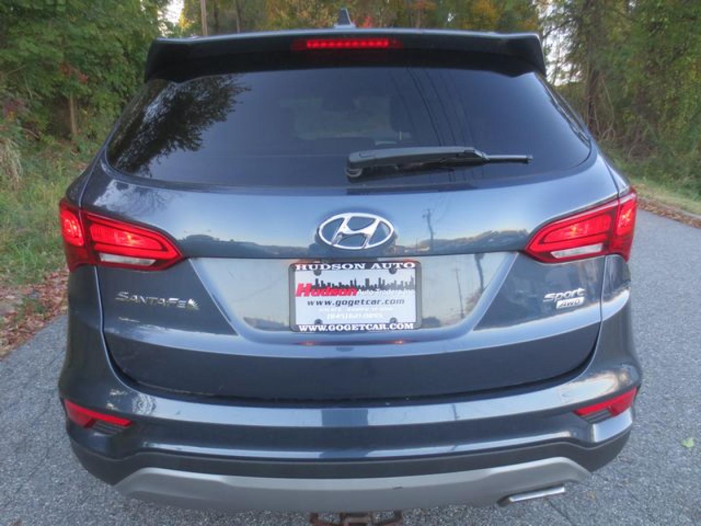 2017 Blue /Gray Hyundai Santa Fe Sport (5NMZUDLB9HH) with an 2.4L L4 DOHC 16V engine, 6 Speed Automatic transmission, located at 270 US Route 6, Mahopac, NY, 10541, (845) 621-0895, 41.349022, -73.755280 - Photo#5