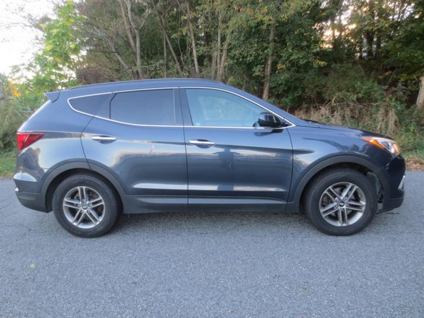 2017 Blue /Gray Hyundai Santa Fe Sport (5NMZUDLB9HH) with an 2.4L L4 DOHC 16V engine, 6 Speed Automatic transmission, located at 270 US Route 6, Mahopac, NY, 10541, (845) 621-0895, 41.349022, -73.755280 - Photo#10