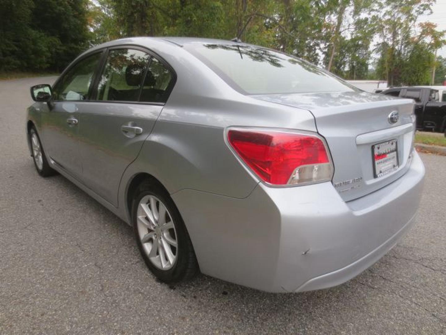 2013 Silver /Black Subaru Impreza Premium w/All Weather Package (JF1GJAC69DH) with an 2.0L H4 DOHC 16V engine, Continuously Variable Transmission transmission, located at 270 US Route 6, Mahopac, NY, 10541, (845) 621-0895, 41.349022, -73.755280 - Photo#4