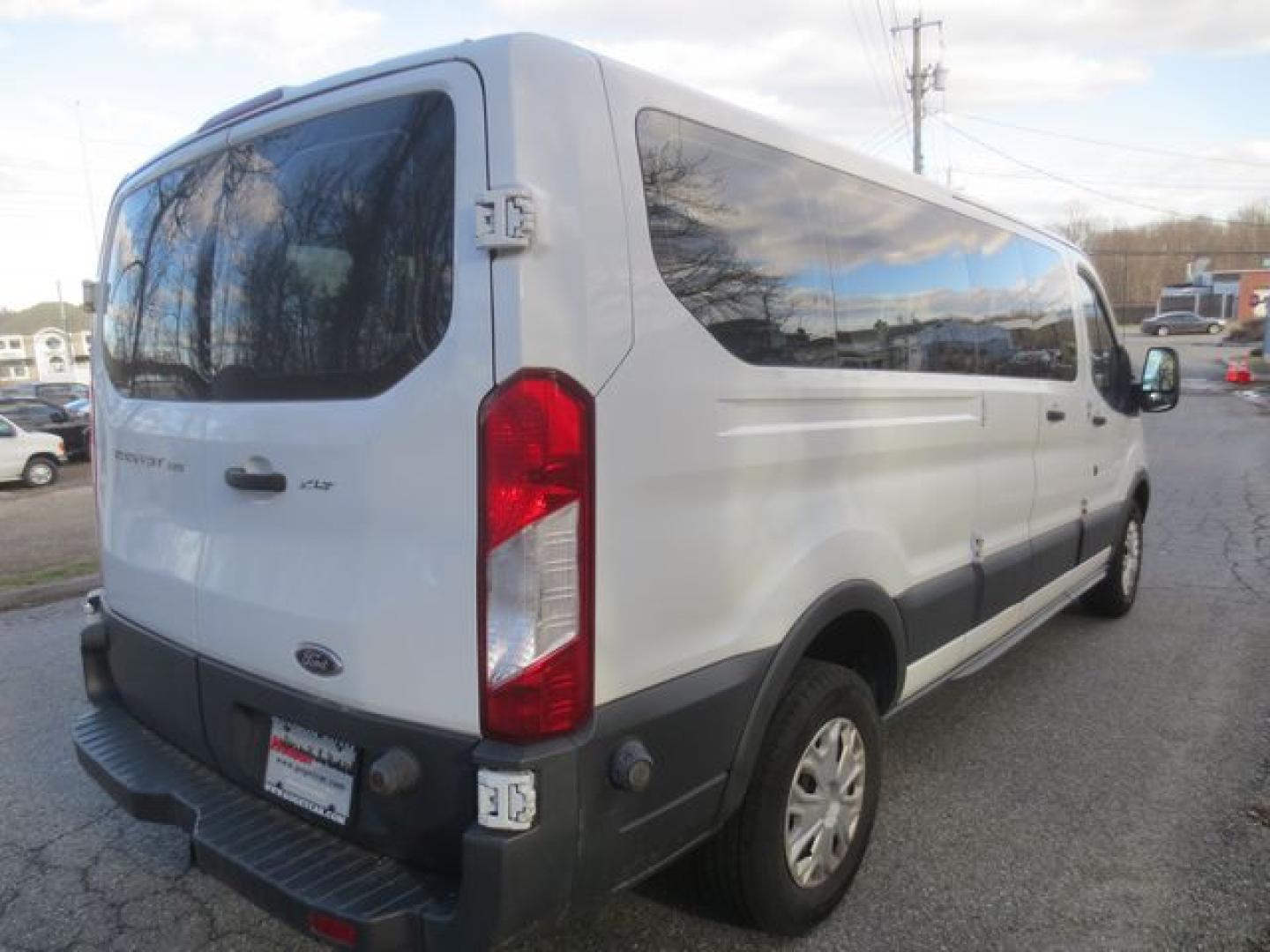 2015 White /Gray Ford Transit Low Roof XLT (1FBZX2ZM0FK) with an 3.7L V6 DOHC 24V engine, 6-Speed Automatic transmission, located at 270 US Route 6, Mahopac, NY, 10541, (845) 621-0895, 41.349022, -73.755280 - Photo#1