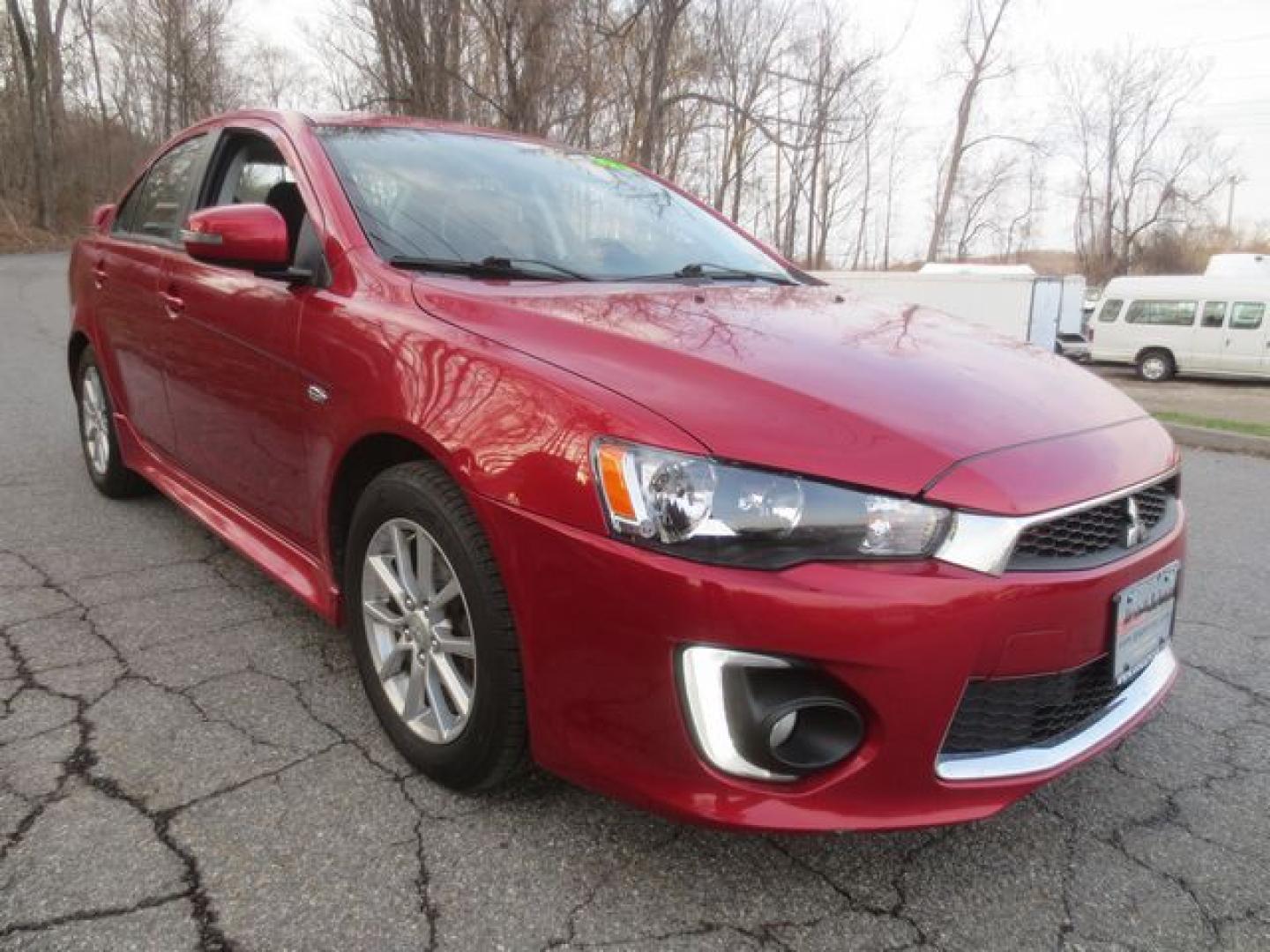 2016 Red /Black Mitsubishi Lancer SE (JA32V2FW1GU) with an 2.4L L4 SOHC 16V engine, CVT transmission, located at 270 US Route 6, Mahopac, NY, 10541, (845) 621-0895, 41.349022, -73.755280 - Photo#1