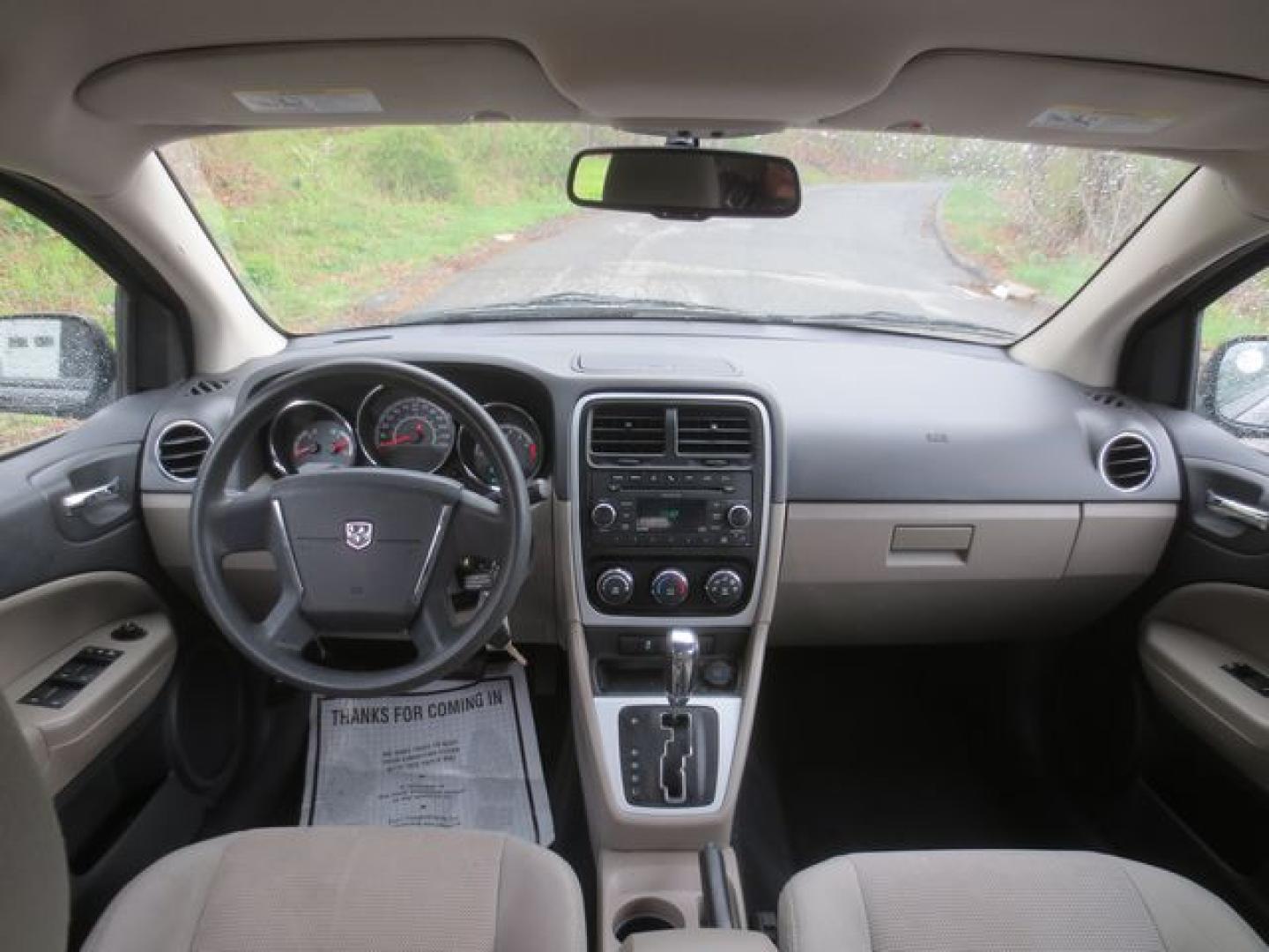 2011 Black /Gray Dodge Caliber Mainstreet (1B3CB3HA7BD) with an 2.0L L4 DOHC 16V engine, Automatic transmission, located at 270 US Route 6, Mahopac, NY, 10541, (845) 621-0895, 41.349022, -73.755280 - Photo#7
