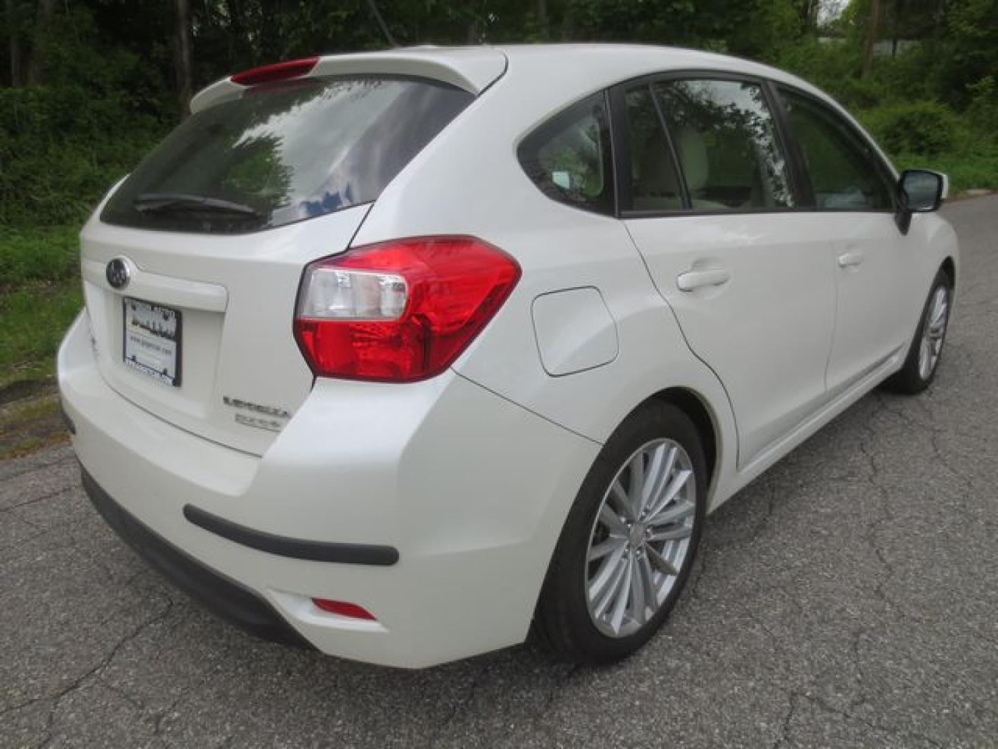 2012 White /Beige Subaru Impreza Premium Plus (JF1GPAE69CH) with an 2.0L H4 DOHC 16V engine, Automatic transmission, located at 270 US Route 6, Mahopac, NY, 10541, (845) 621-0895, 41.349022, -73.755280 - Photo#3