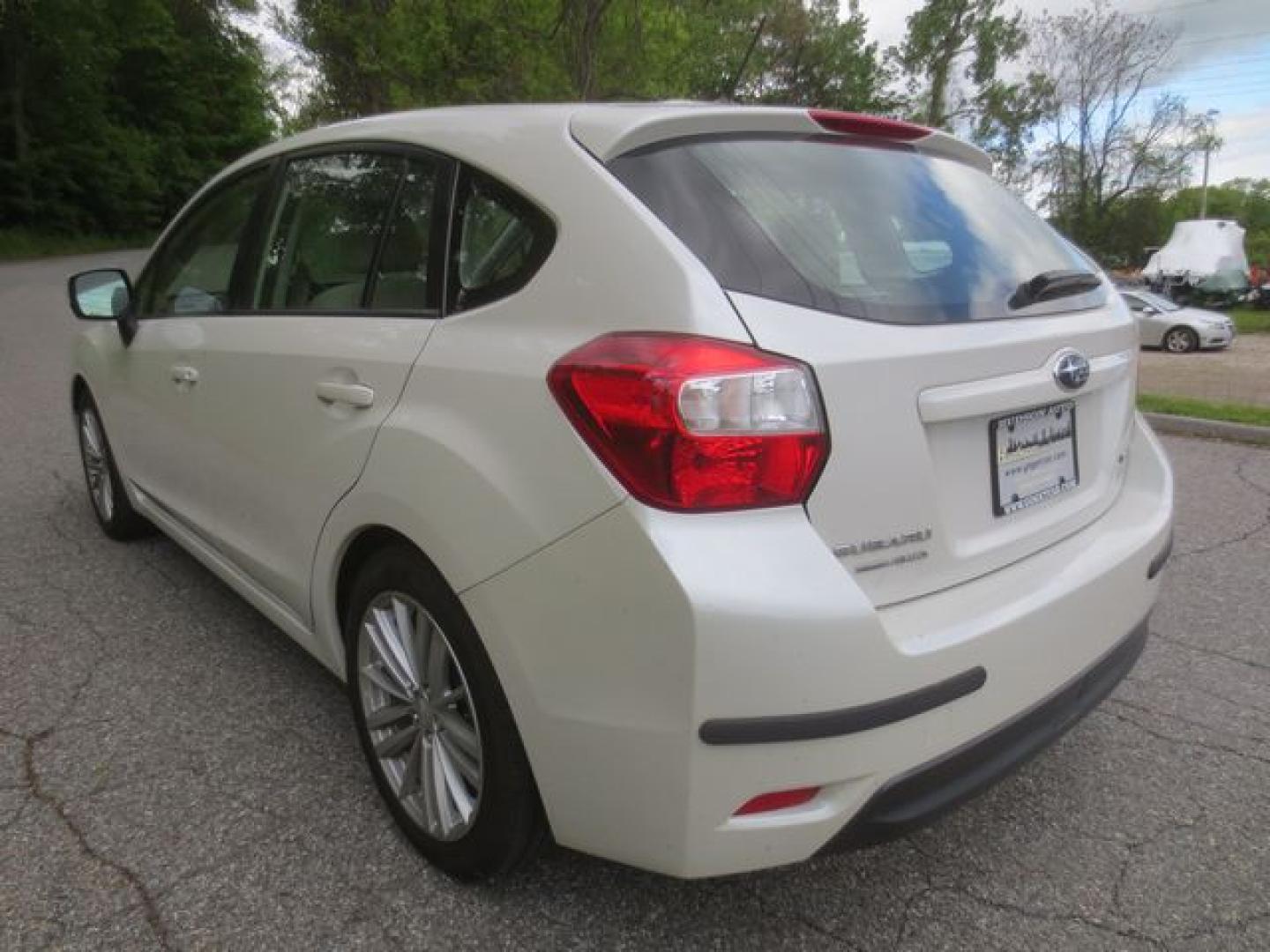 2012 White /Beige Subaru Impreza Premium Plus (JF1GPAE69CH) with an 2.0L H4 DOHC 16V engine, Automatic transmission, located at 270 US Route 6, Mahopac, NY, 10541, (845) 621-0895, 41.349022, -73.755280 - Photo#4