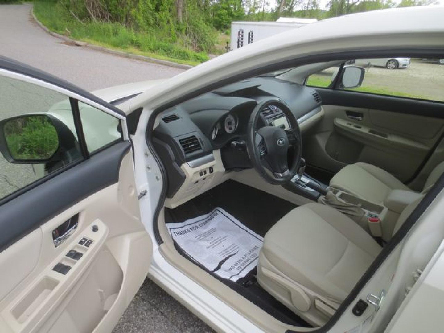 2012 White /Beige Subaru Impreza Premium Plus (JF1GPAE69CH) with an 2.0L H4 DOHC 16V engine, Automatic transmission, located at 270 US Route 6, Mahopac, NY, 10541, (845) 621-0895, 41.349022, -73.755280 - Photo#6