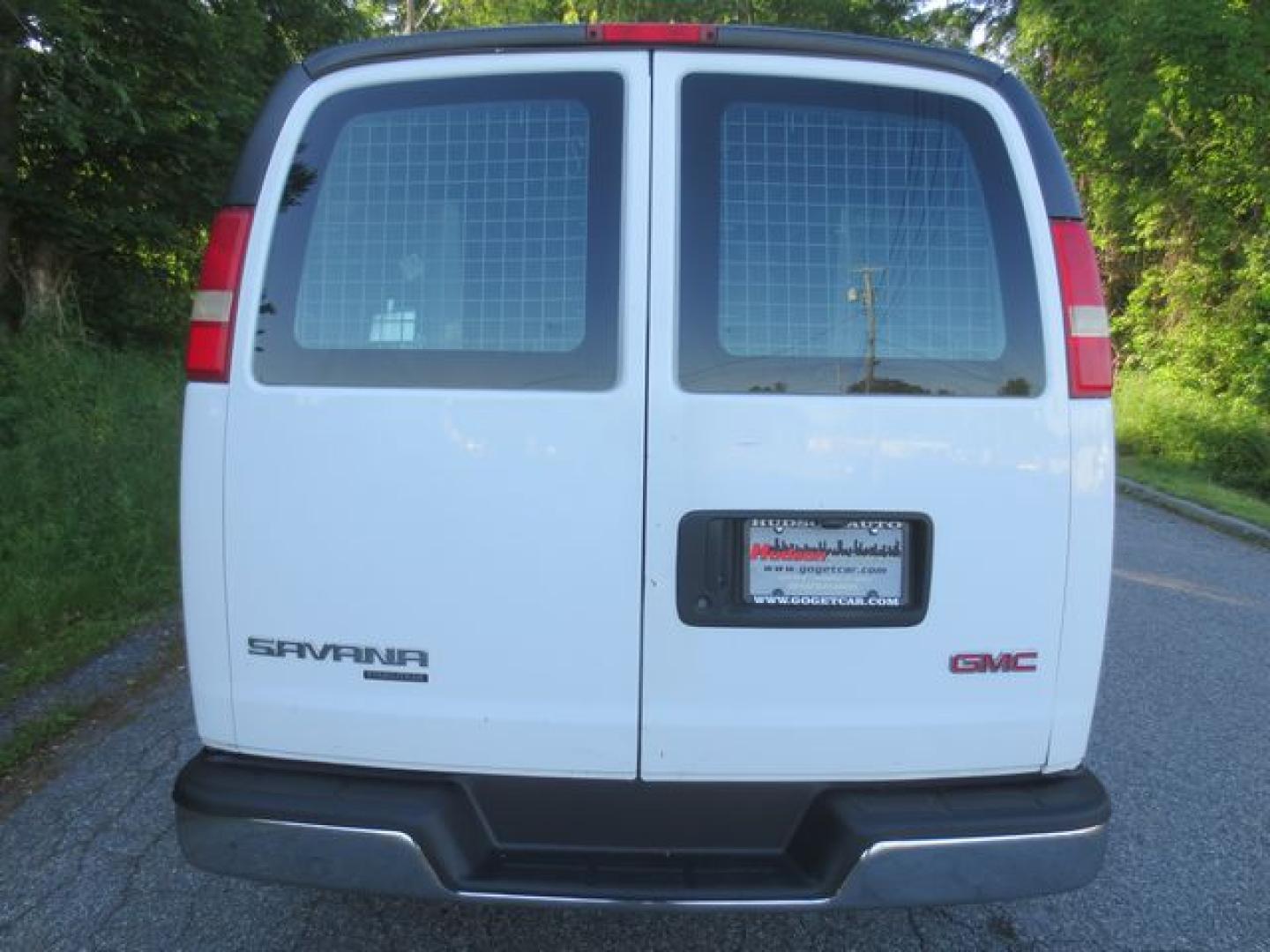 2014 White /Gray GMC Savana G2500 Cargo (1GTW7FCA4E1) with an 4.8L V8 OHV 16V FFV engine, 6-Speed Automatic transmission, located at 270 US Route 6, Mahopac, NY, 10541, (845) 621-0895, 41.349022, -73.755280 - Photo#5