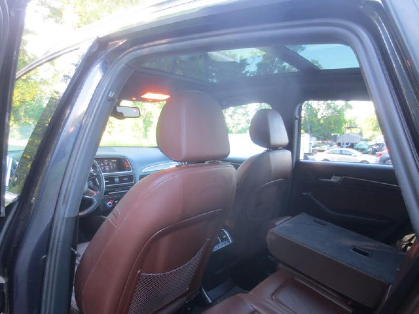 2016 Blue /Saddle Audi Q5 Premium Plus (WA1L2AFPXGA) with an 2.0L L4 DOHC 16V engine, Automatic transmission, located at 270 US Route 6, Mahopac, NY, 10541, (845) 621-0895, 41.349022, -73.755280 - Photo#9