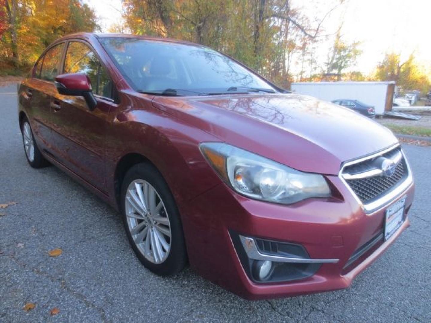 2015 Red /Black Subaru Impreza 2.0i Limited PZEV (JF1GJAN63FH) with an 2.0L H4 DOHC 16V engine, Automatic transmission, located at 270 US Route 6, Mahopac, NY, 10541, (845) 621-0895, 41.349022, -73.755280- Photo#1