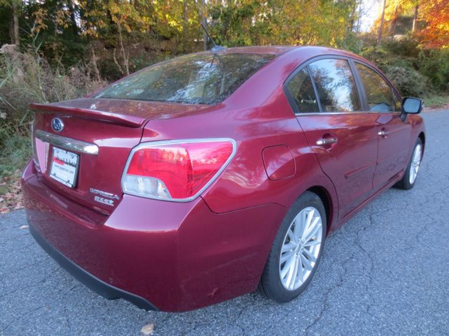 2015 Red /Black Subaru Impreza 2.0i Limited PZEV (JF1GJAN63FH) with an 2.0L H4 DOHC 16V engine, Automatic transmission, located at 270 US Route 6, Mahopac, NY, 10541, (845) 621-0895, 41.349022, -73.755280- Photo#3