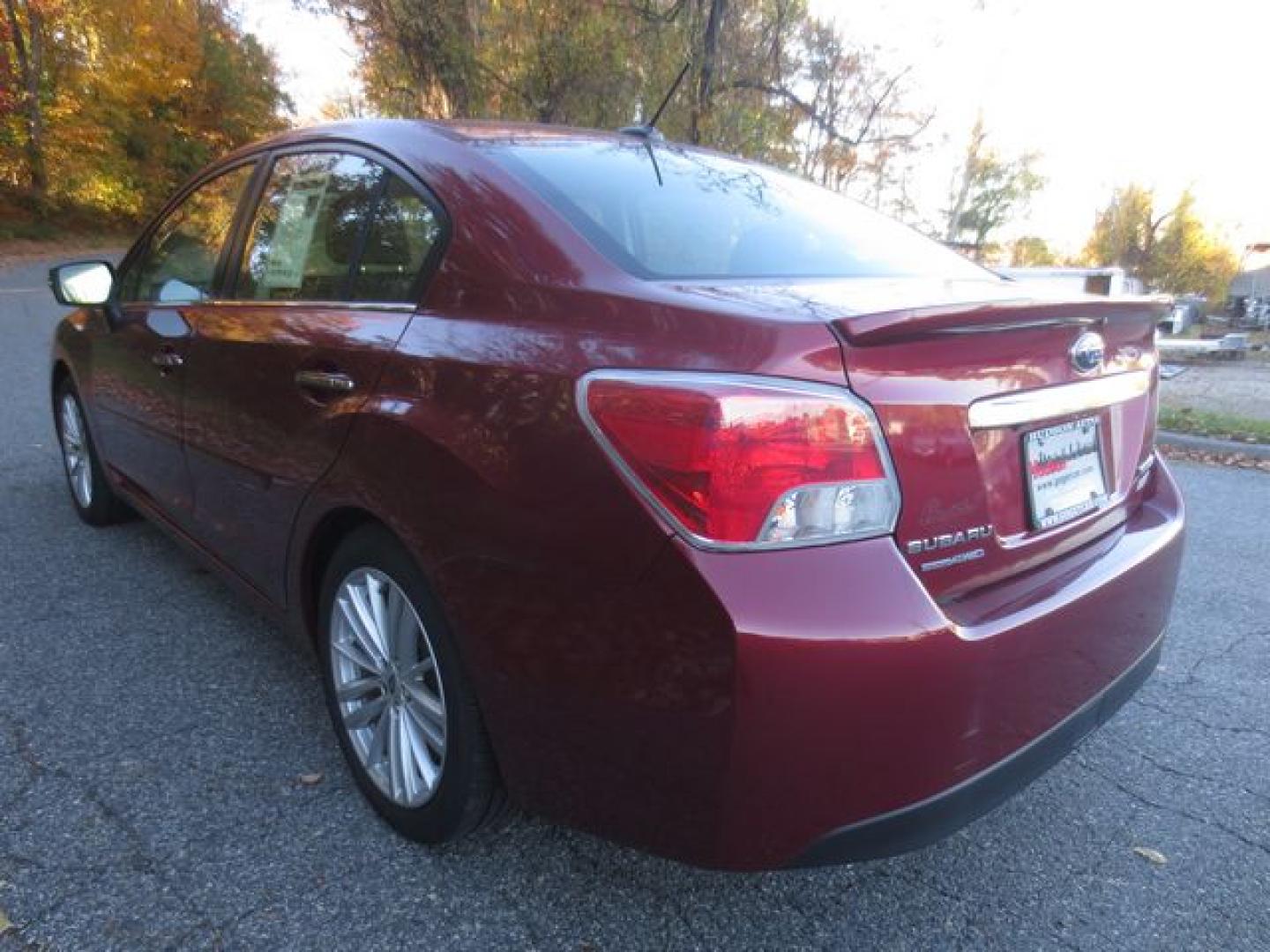 2015 Red /Black Subaru Impreza 2.0i Limited PZEV (JF1GJAN63FH) with an 2.0L H4 DOHC 16V engine, Automatic transmission, located at 270 US Route 6, Mahopac, NY, 10541, (845) 621-0895, 41.349022, -73.755280- Photo#4