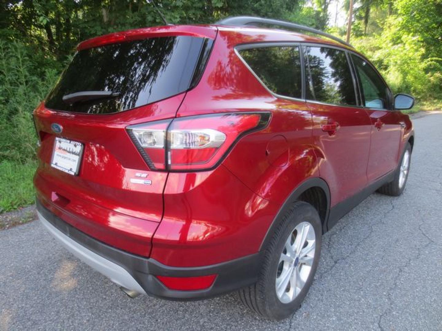 2017 Black /Red Ford Escape SE (1FMCU9GD0HU) with an 1.5L L4 DOHC 16V engine, Automatic transmission, located at 270 US Route 6, Mahopac, NY, 10541, (845) 621-0895, 41.349022, -73.755280- Photo#3