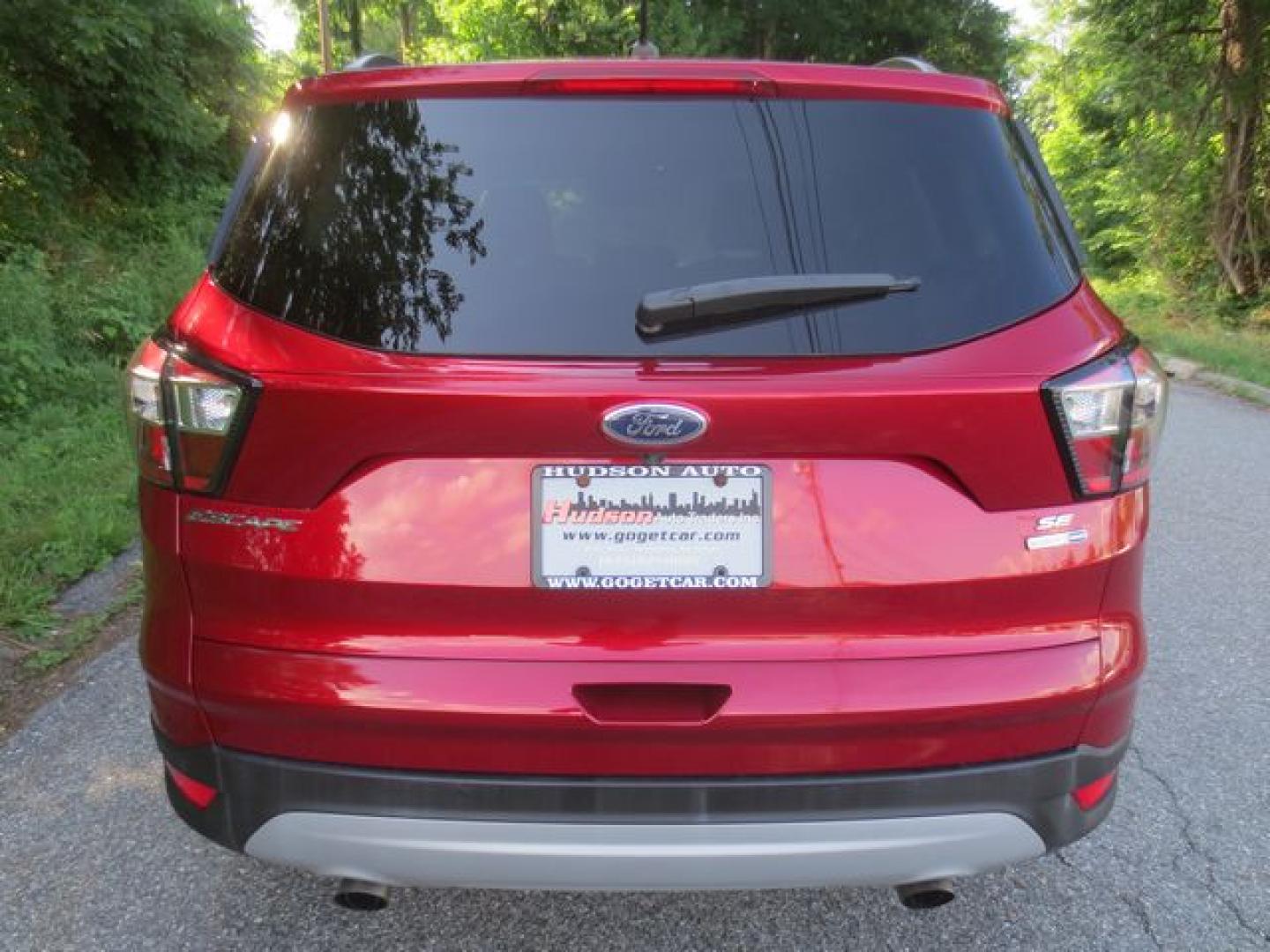 2017 Black /Red Ford Escape SE (1FMCU9GD0HU) with an 1.5L L4 DOHC 16V engine, Automatic transmission, located at 270 US Route 6, Mahopac, NY, 10541, (845) 621-0895, 41.349022, -73.755280- Photo#5