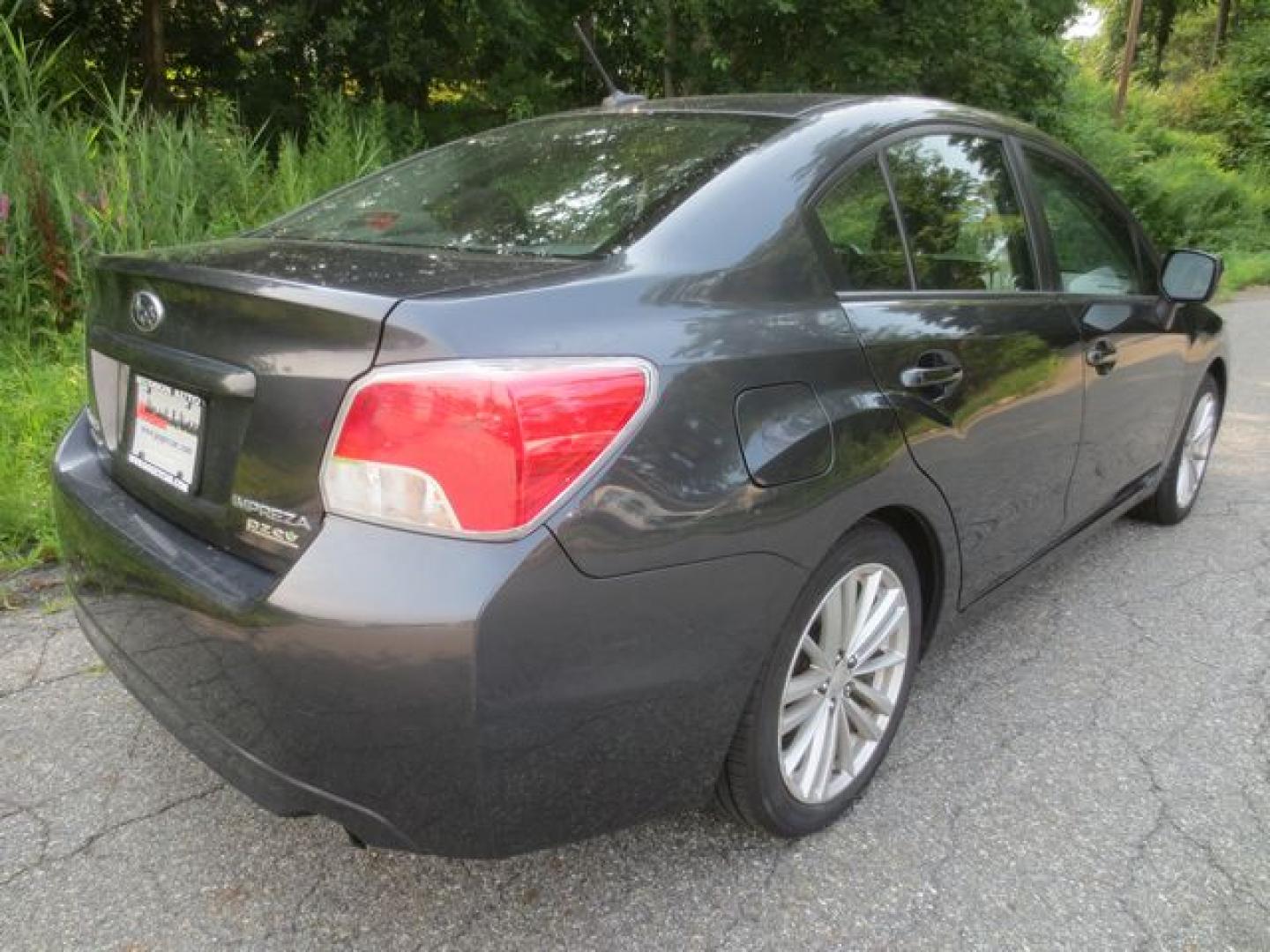 2012 Gray /Black Subaru Impreza Premium Plus (JF1GJAF61CH) with an 2.0L H4 DOHC 16V engine, Automatic transmission, located at 270 US Route 6, Mahopac, NY, 10541, (845) 621-0895, 41.349022, -73.755280- Photo#3