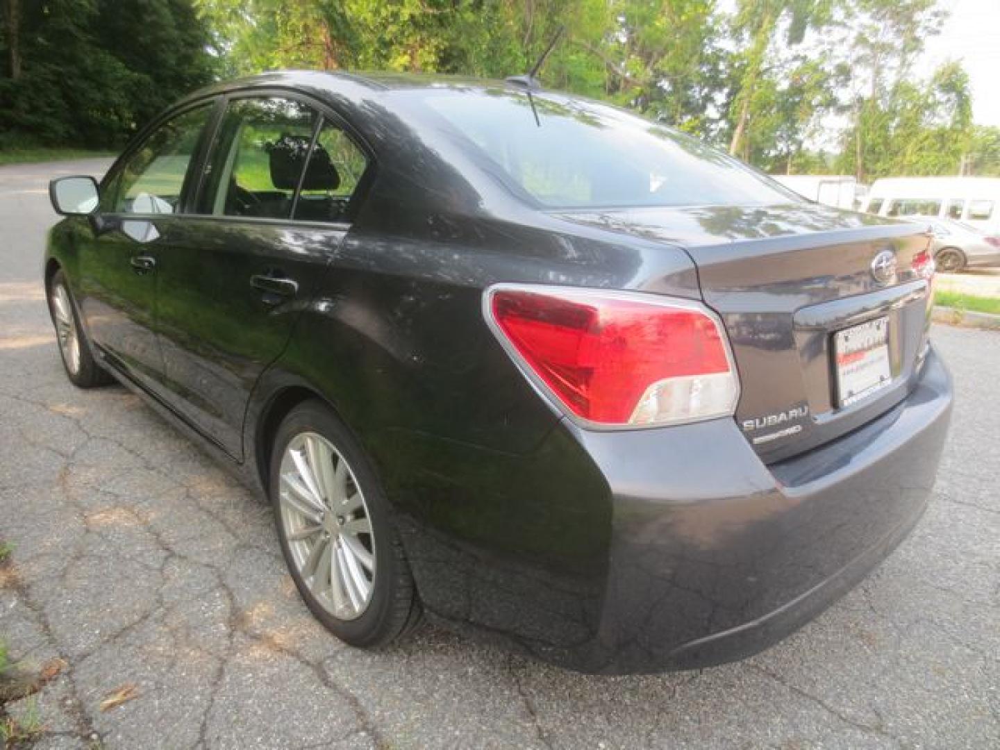 2012 Gray /Black Subaru Impreza Premium Plus (JF1GJAF61CH) with an 2.0L H4 DOHC 16V engine, Automatic transmission, located at 270 US Route 6, Mahopac, NY, 10541, (845) 621-0895, 41.349022, -73.755280- Photo#4