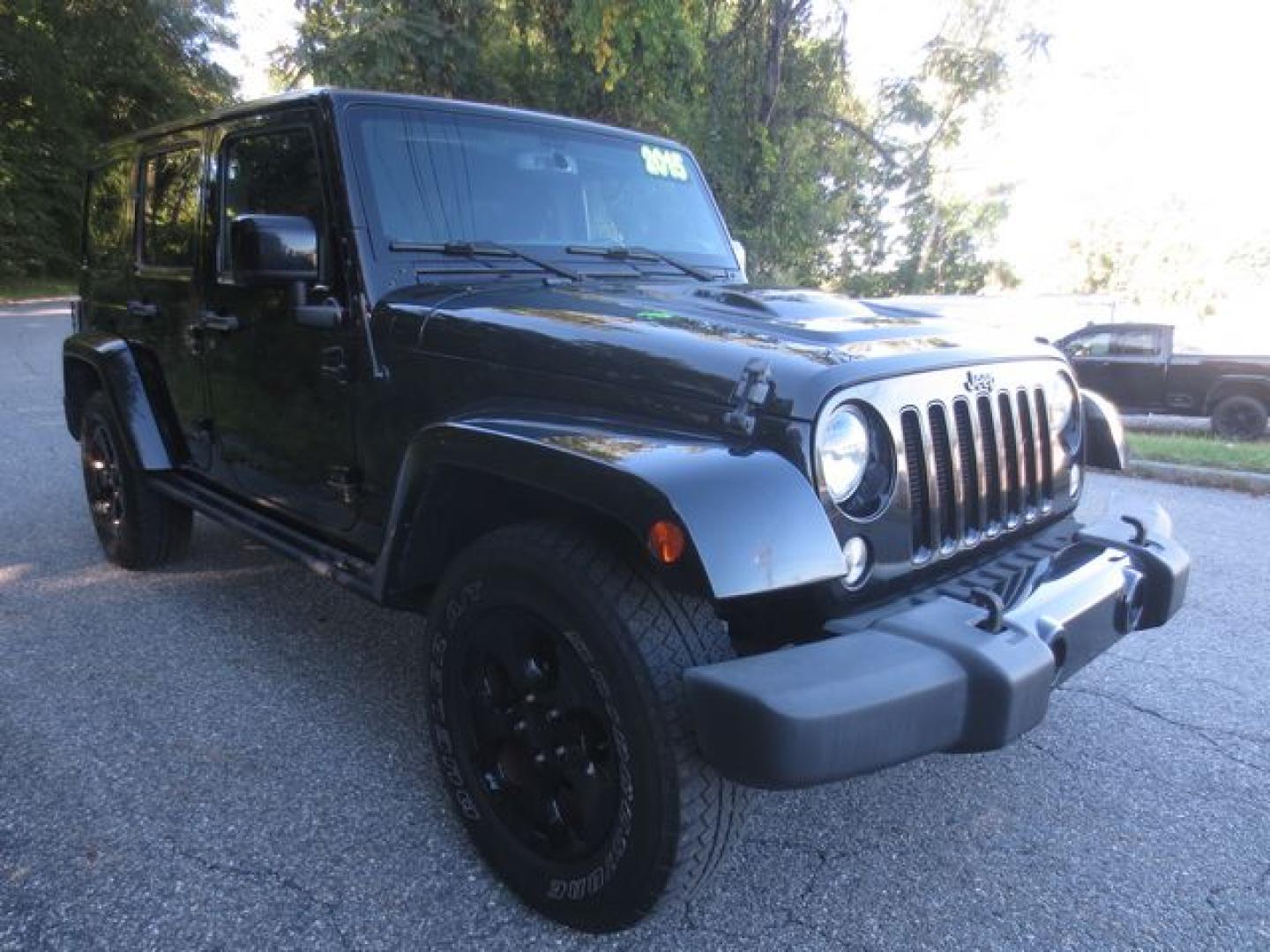 2015 Black /Black Jeep Wrangler Unlimited Altitude (1C4BJWEGXFL) with an 3.6L V6 DOHC 24V FFV engine, Automatic transmission, located at 270 US Route 6, Mahopac, NY, 10541, (845) 621-0895, 41.349022, -73.755280- Photo#1