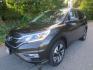 2016 Brown /Black Honda CR-V Touring (5J6RM4H97GL) with an 2.4L L4 DOHC 16V engine, Automatic transmission, located at 270 US Route 6, Mahopac, NY, 10541, (845) 621-0895, 41.349022, -73.755280- Photo#0